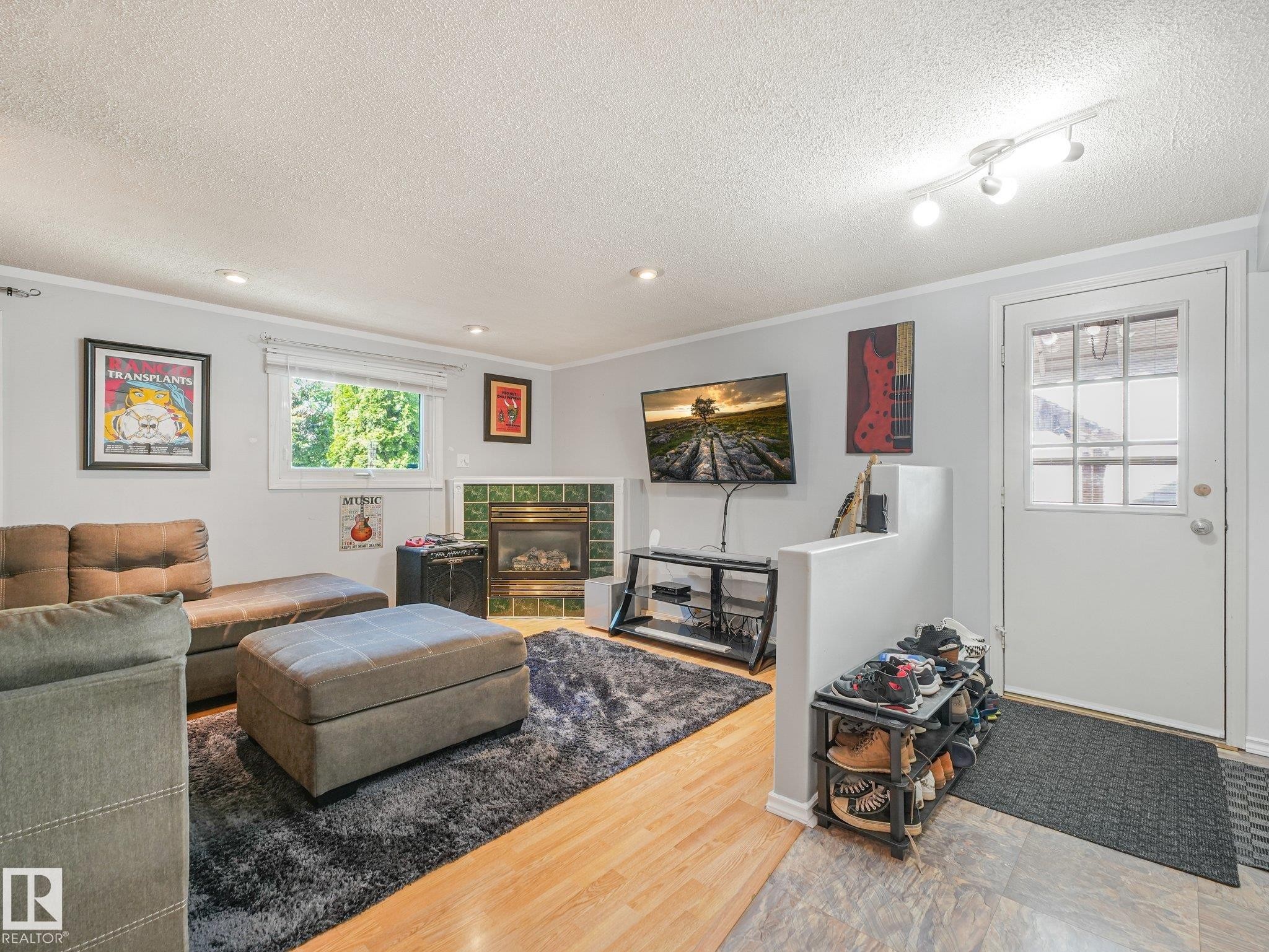 3527 41 Avenue Nw, Edmonton, AB - Indoor Photo Showing Other Room With Fireplace