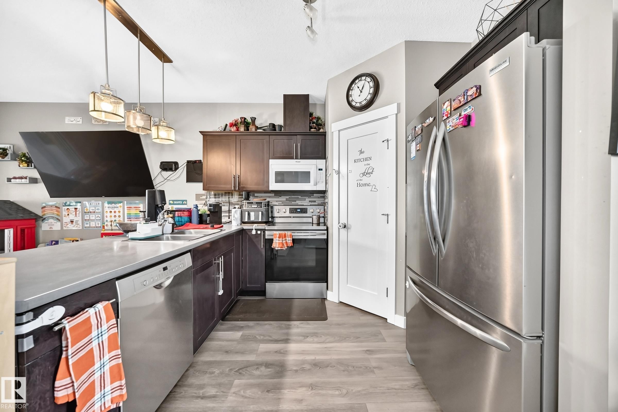 689 Black Boulevard, Leduc, AB - Indoor Photo Showing Kitchen With Double Sink