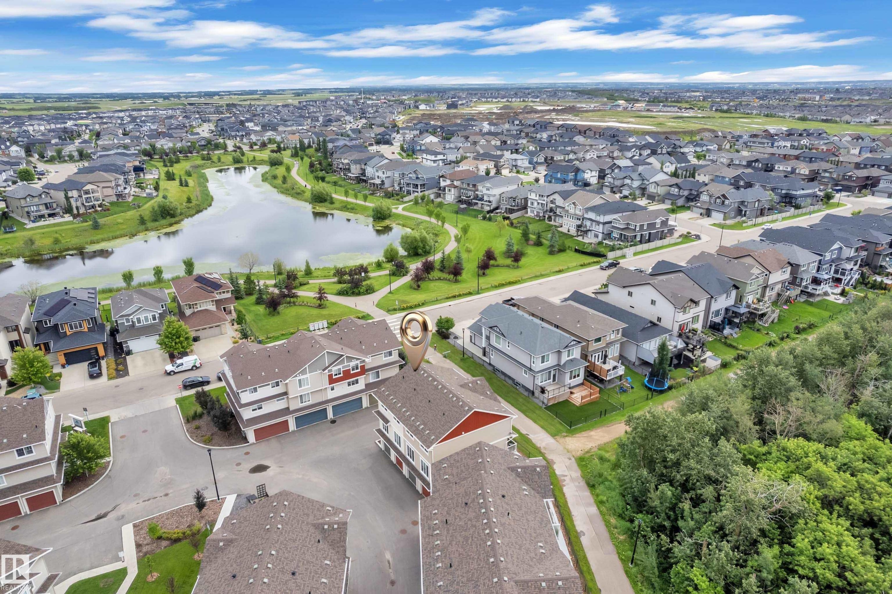 Townhome property featuring a multi-level design and an attached garage - #64 17832 78 St Nw Nw, Edmonton, AB - Outdoor With View