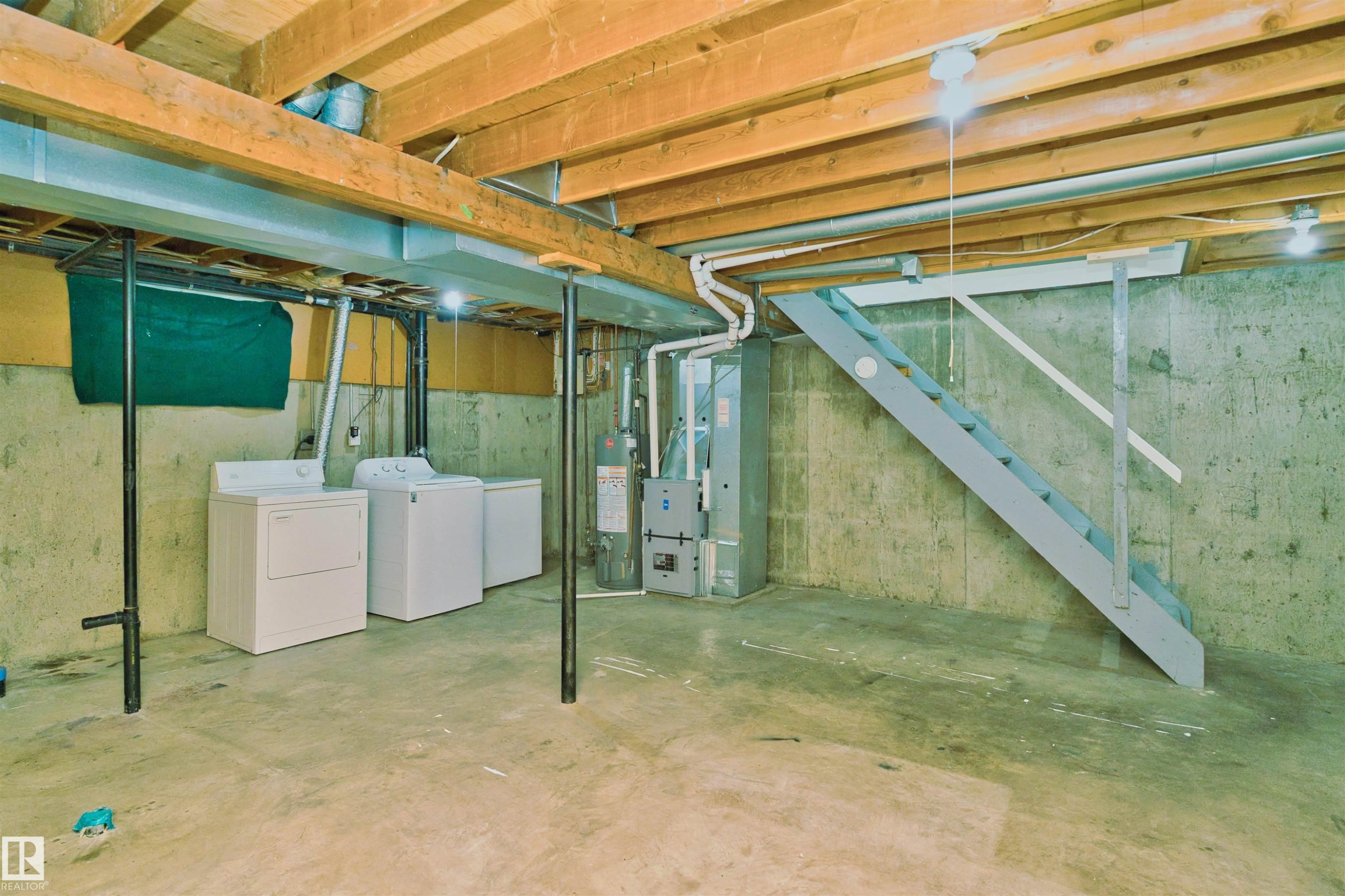 Unfinished basement - 1679 Lakewood Road Nw, Edmonton, AB - Indoor Photo Showing Laundry Room