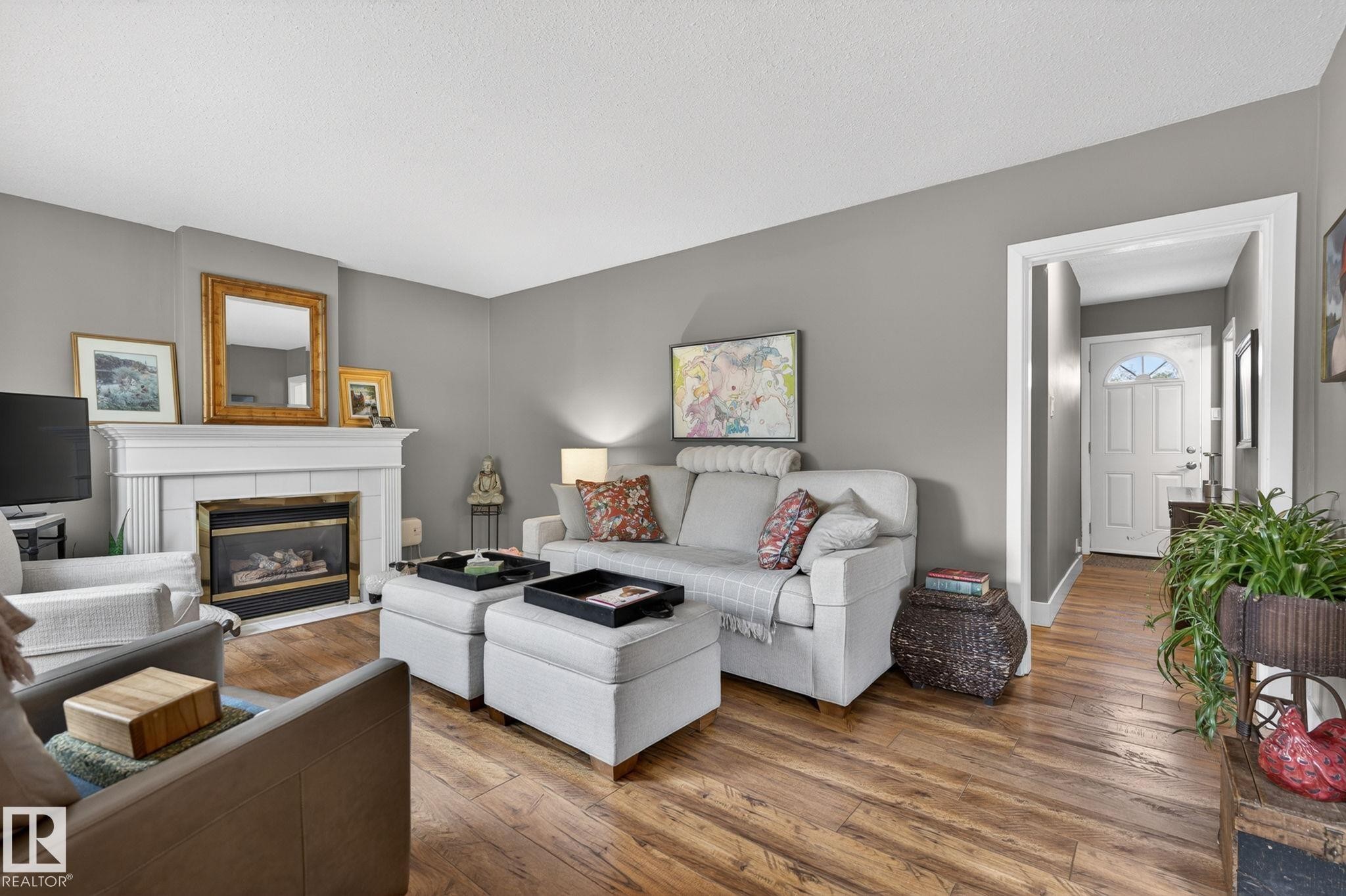 10108 144 Street Nw, Edmonton, AB - Indoor Photo Showing Living Room With Fireplace