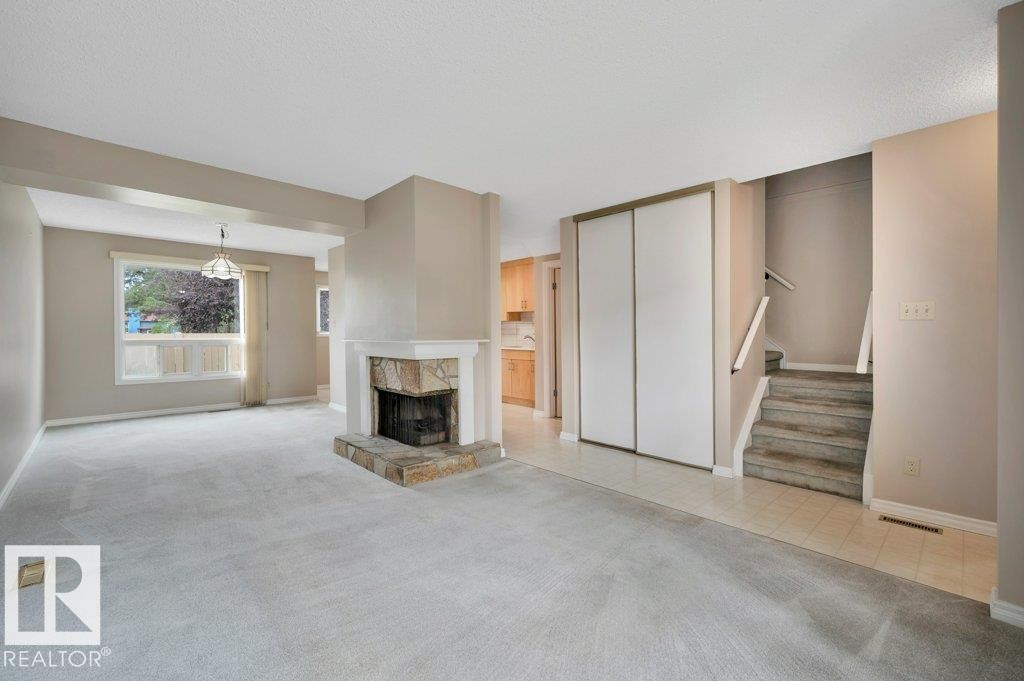 #22 1651 46 St Nw, Edmonton, AB - Indoor Photo Showing Other Room With Fireplace
