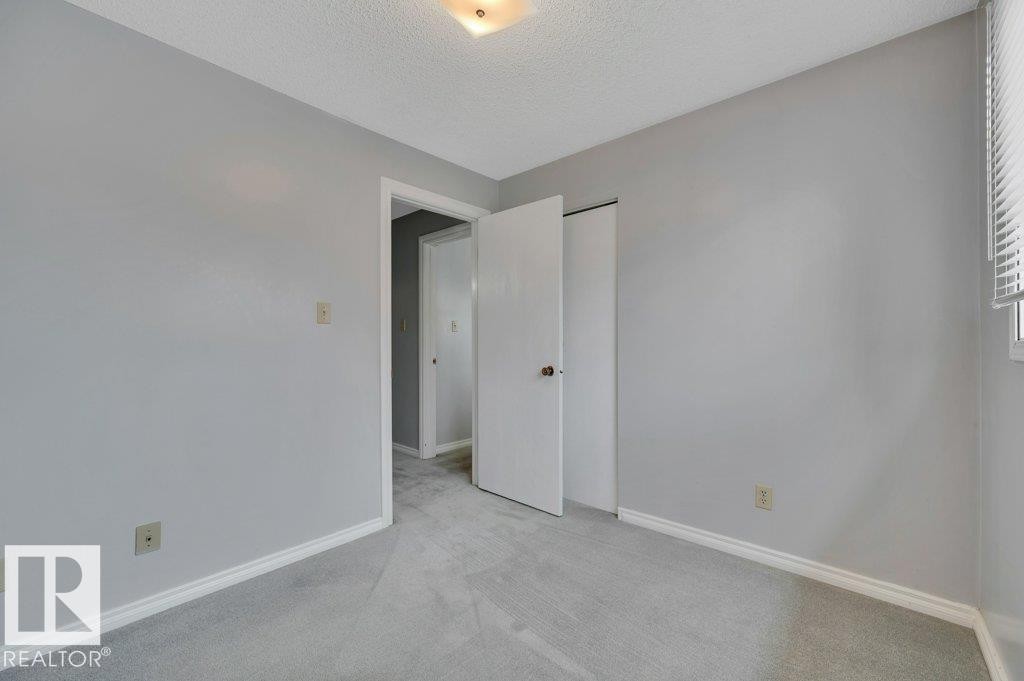 #22 1651 46 St Nw, Edmonton, AB - Indoor Photo Showing Other Room