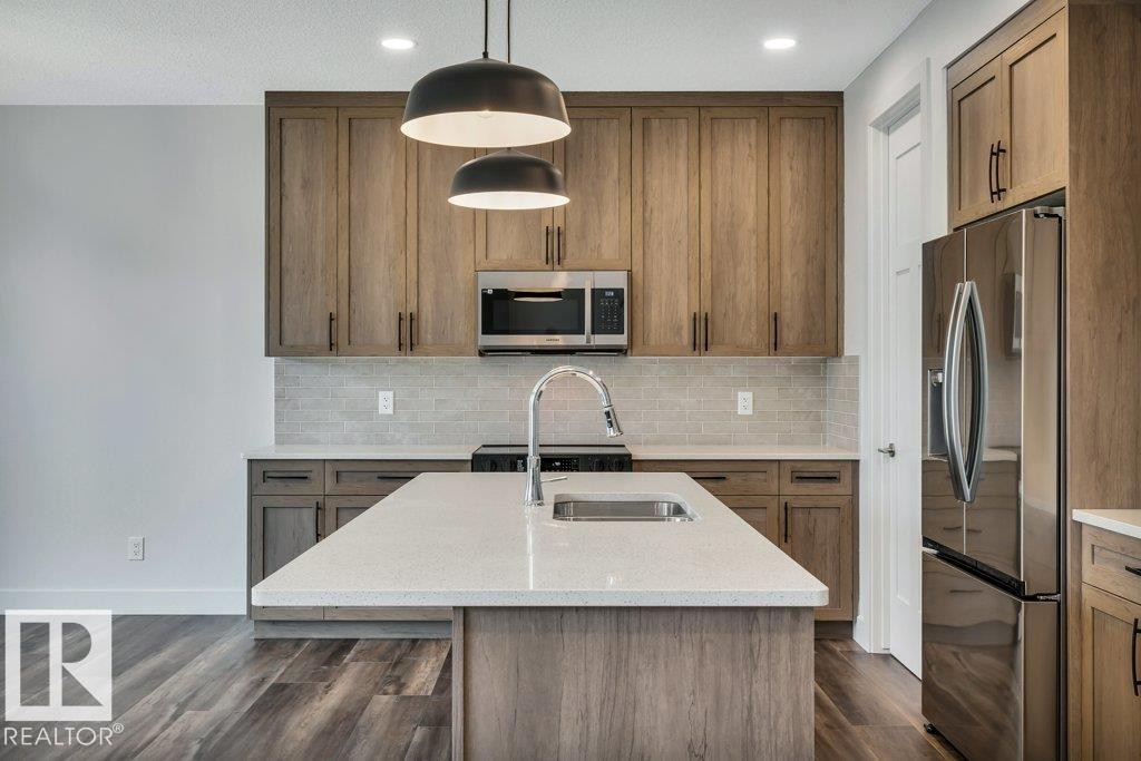13 Hillwood Terrace, Spruce Grove, AB - Indoor Photo Showing Kitchen With Stainless Steel Kitchen With Upgraded Kitchen
