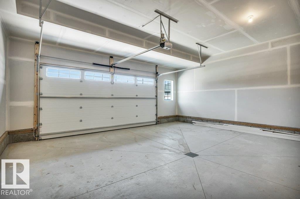13 Hillwood Terrace, Spruce Grove, AB - Indoor Photo Showing Garage