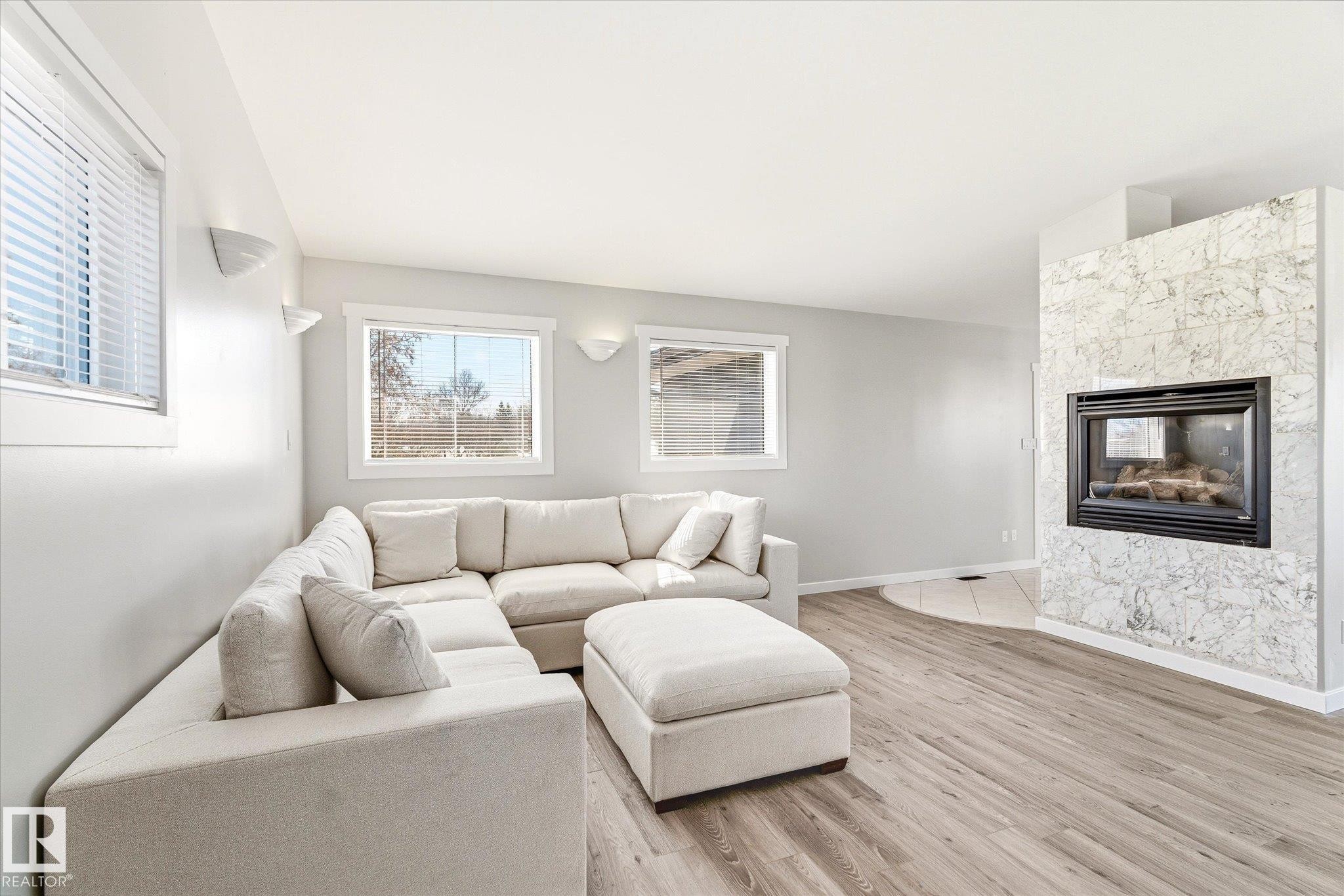 67 Arlington Drive, St. Albert, AB - Indoor Photo Showing Living Room With Fireplace
