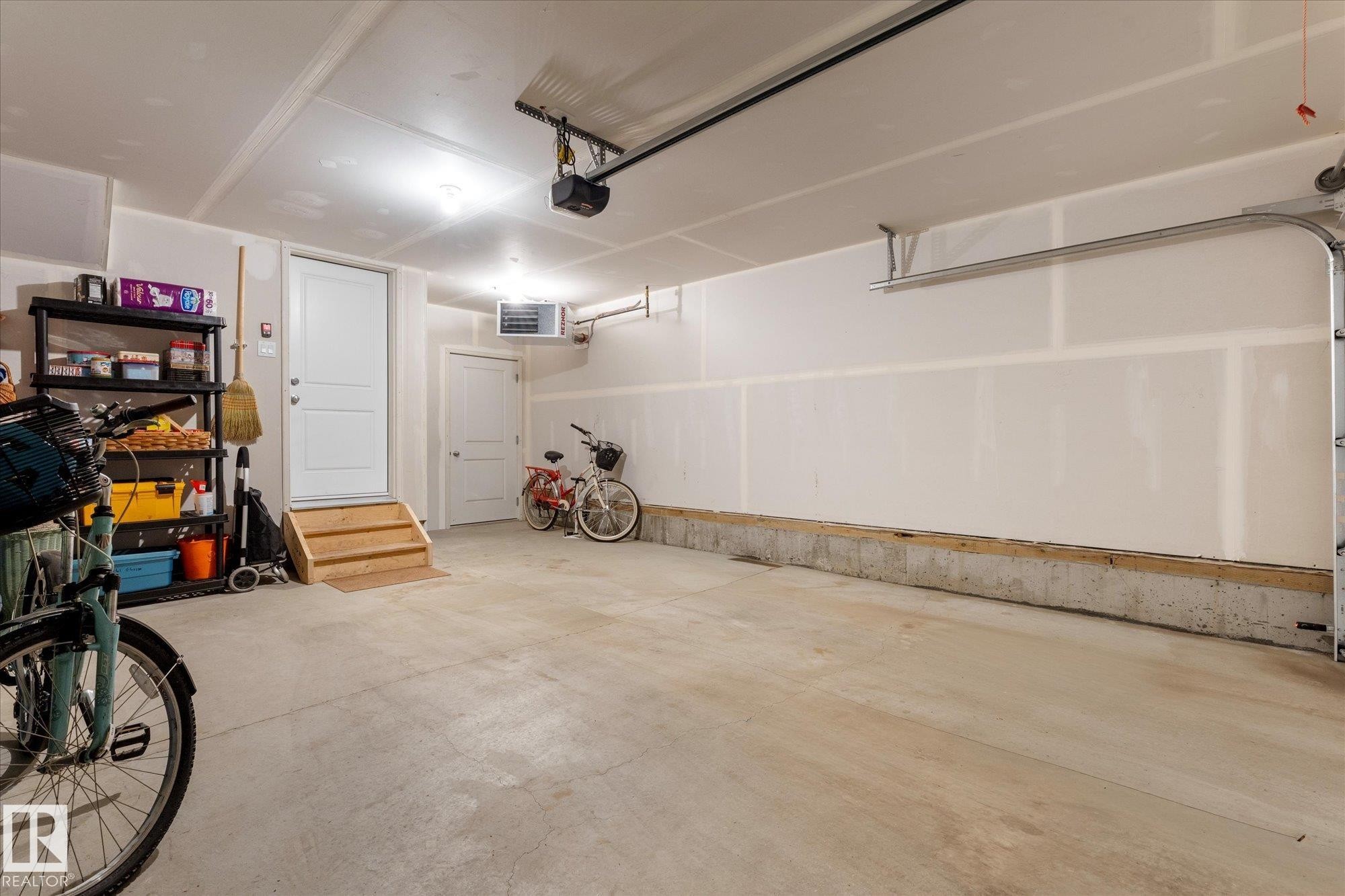 #95 50 Mclaughlin Dr, Spruce Grove, AB - Indoor Photo Showing Garage
