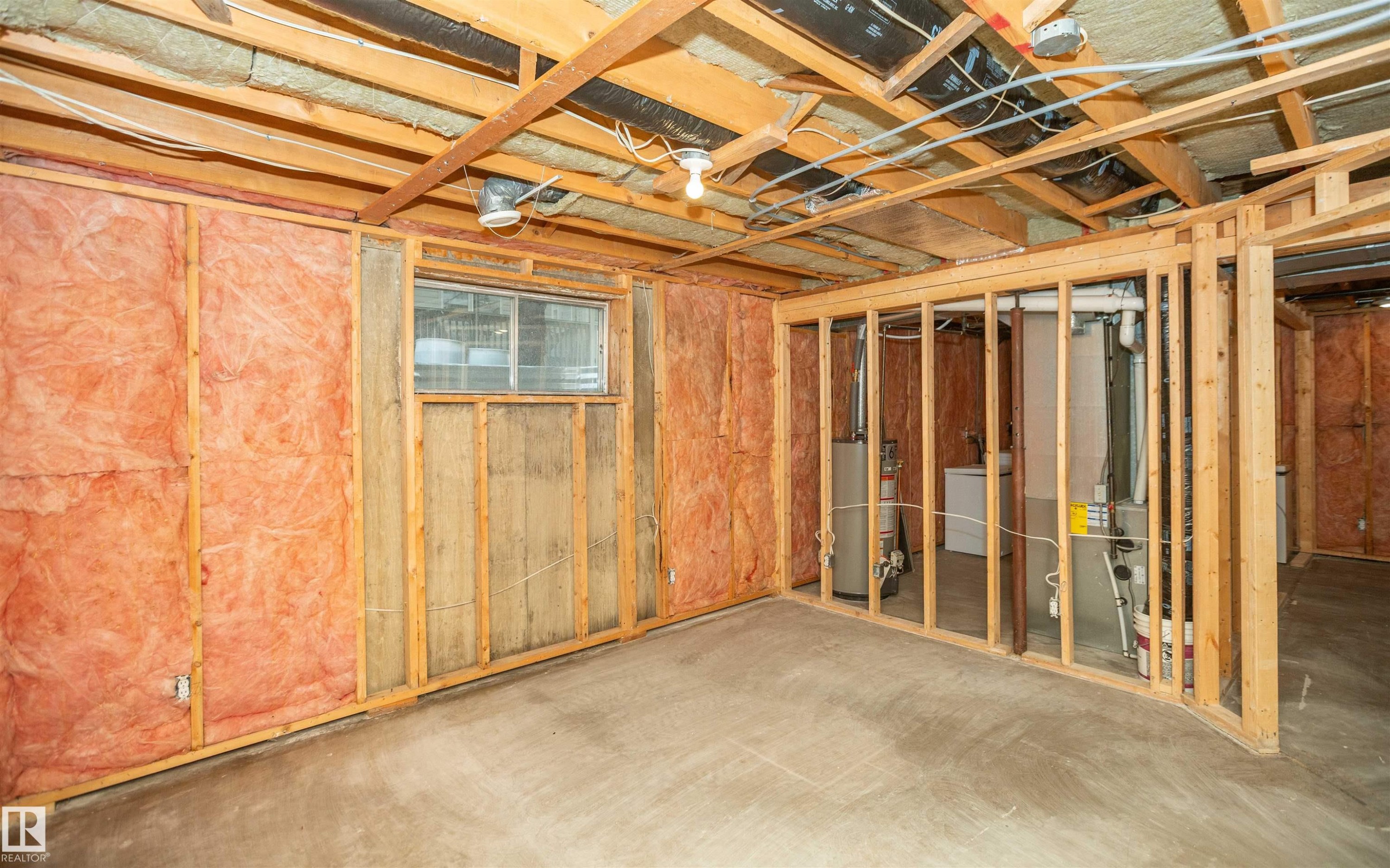 Unfinished basement offering exposed wood framing, ceiling joists, and a concrete floor - 5116 51 Avenue, Pickardville, AB - Indoor Photo Showing Basement