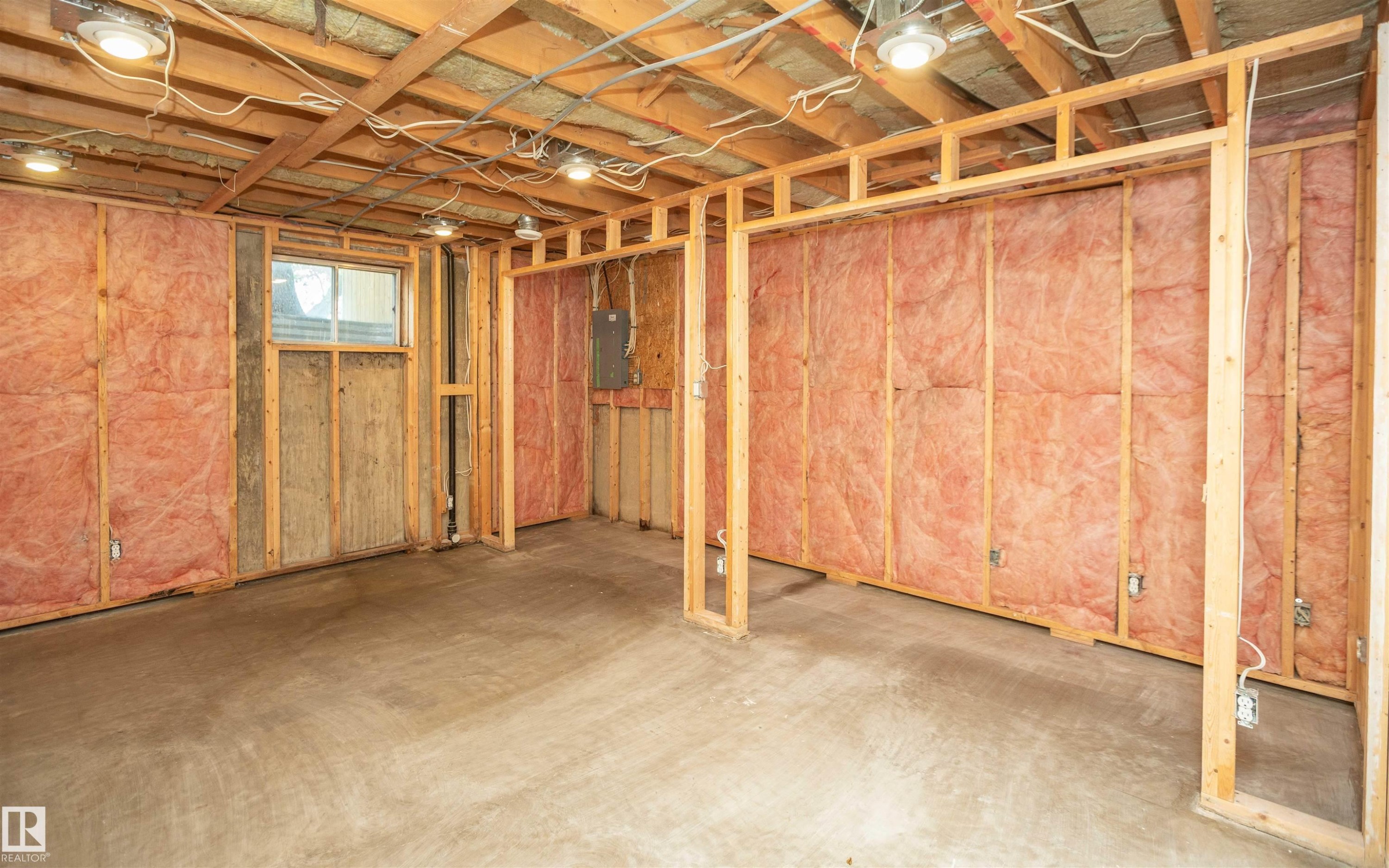 Unfinished interior space with exposed wood framing and insulation - 5116 51 Avenue, Pickardville, AB - Indoor Photo Showing Basement