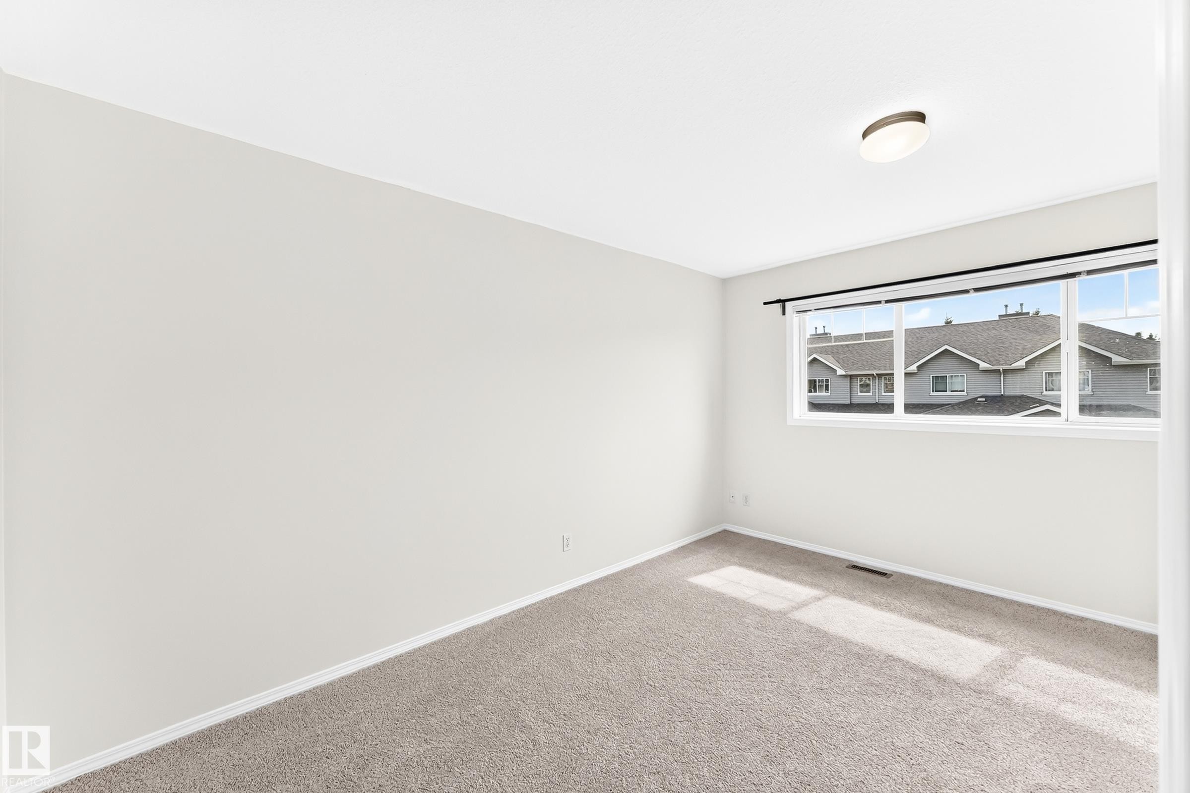 #93 230 Edwards Dr Sw, Edmonton, AB - Indoor Photo Showing Other Room