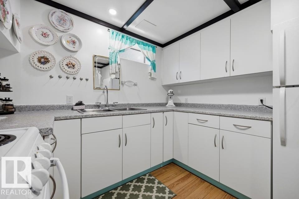 9823 151 Street Nw, Edmonton, AB - Indoor Photo Showing Kitchen With Double Sink
