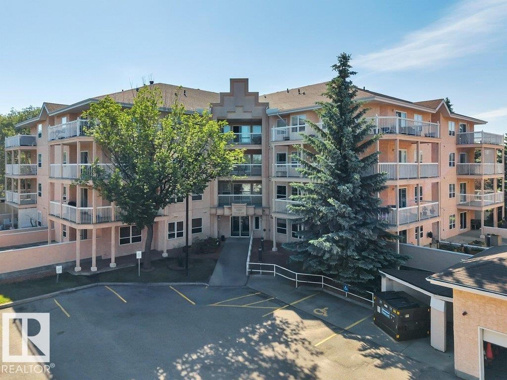 #404E 17511 98A Av Nw, Edmonton, AB - Outdoor With Balcony With Facade