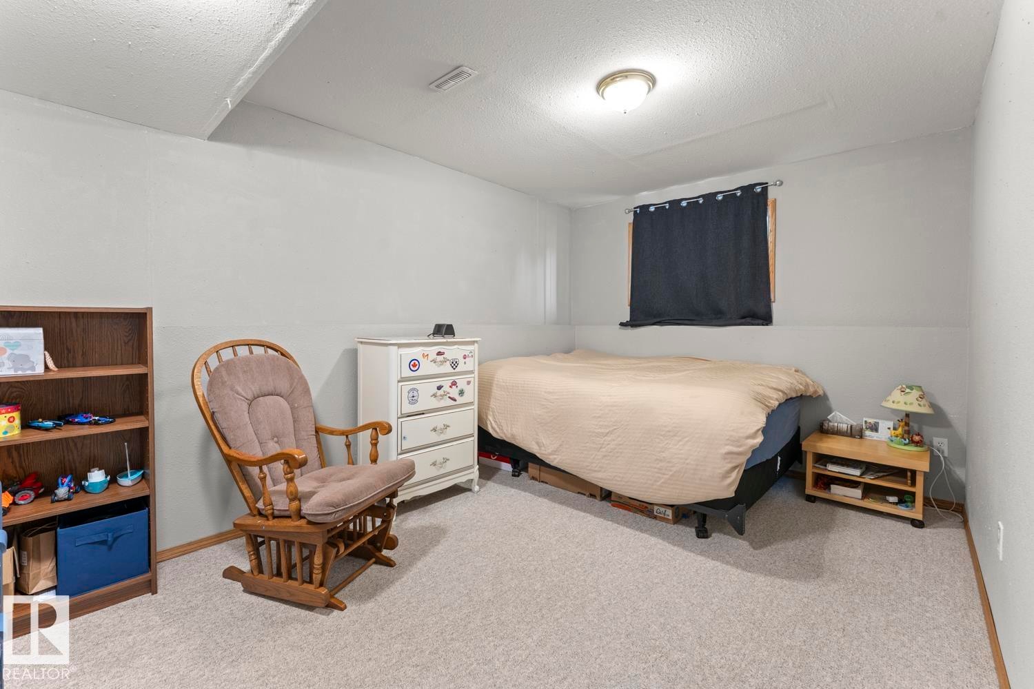 812 12 Avenue, Cold Lake, AB - Indoor Photo Showing Bedroom