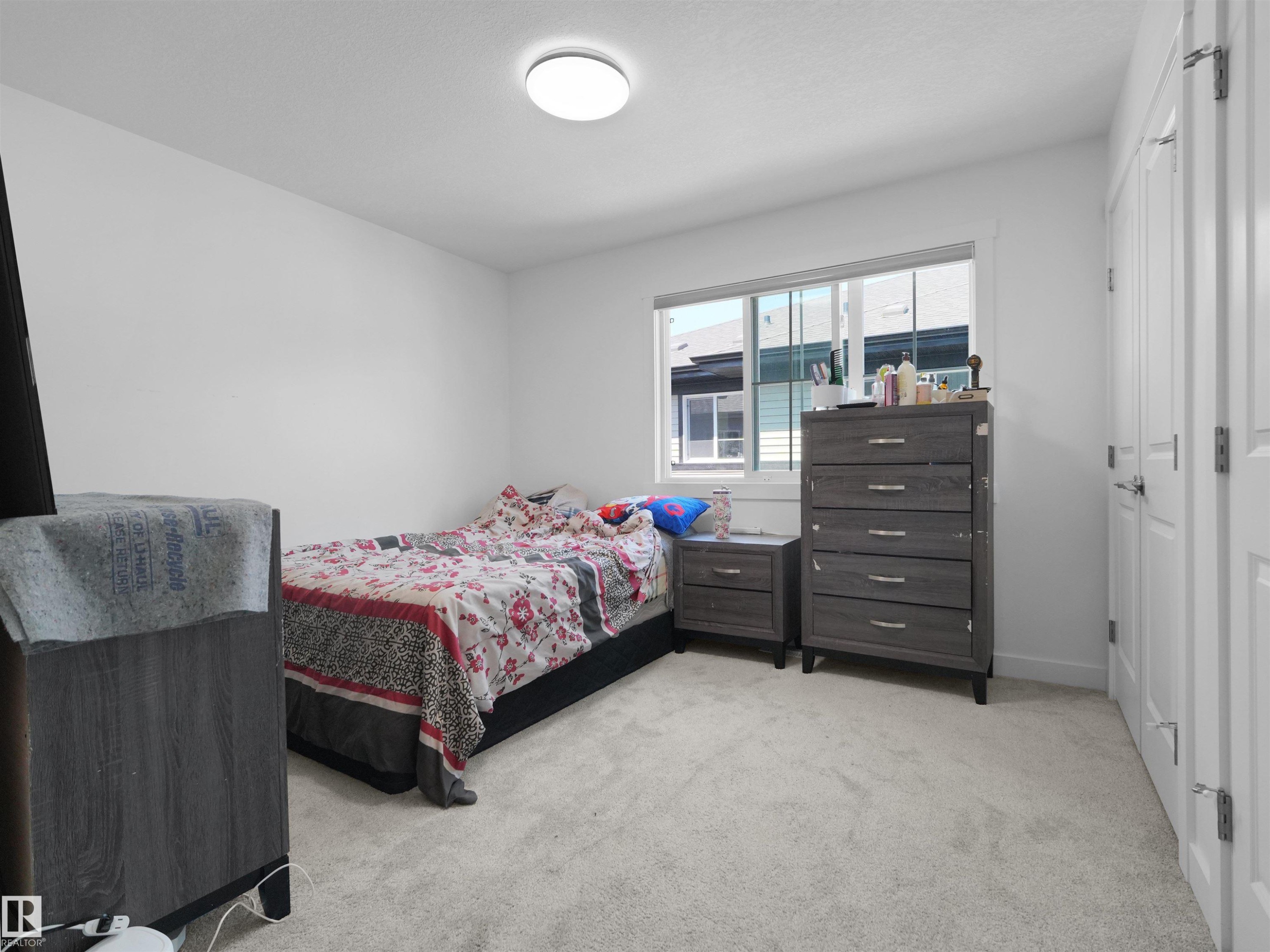#7 7110 Keswick Common Sw, Edmonton, AB - Indoor Photo Showing Bedroom
