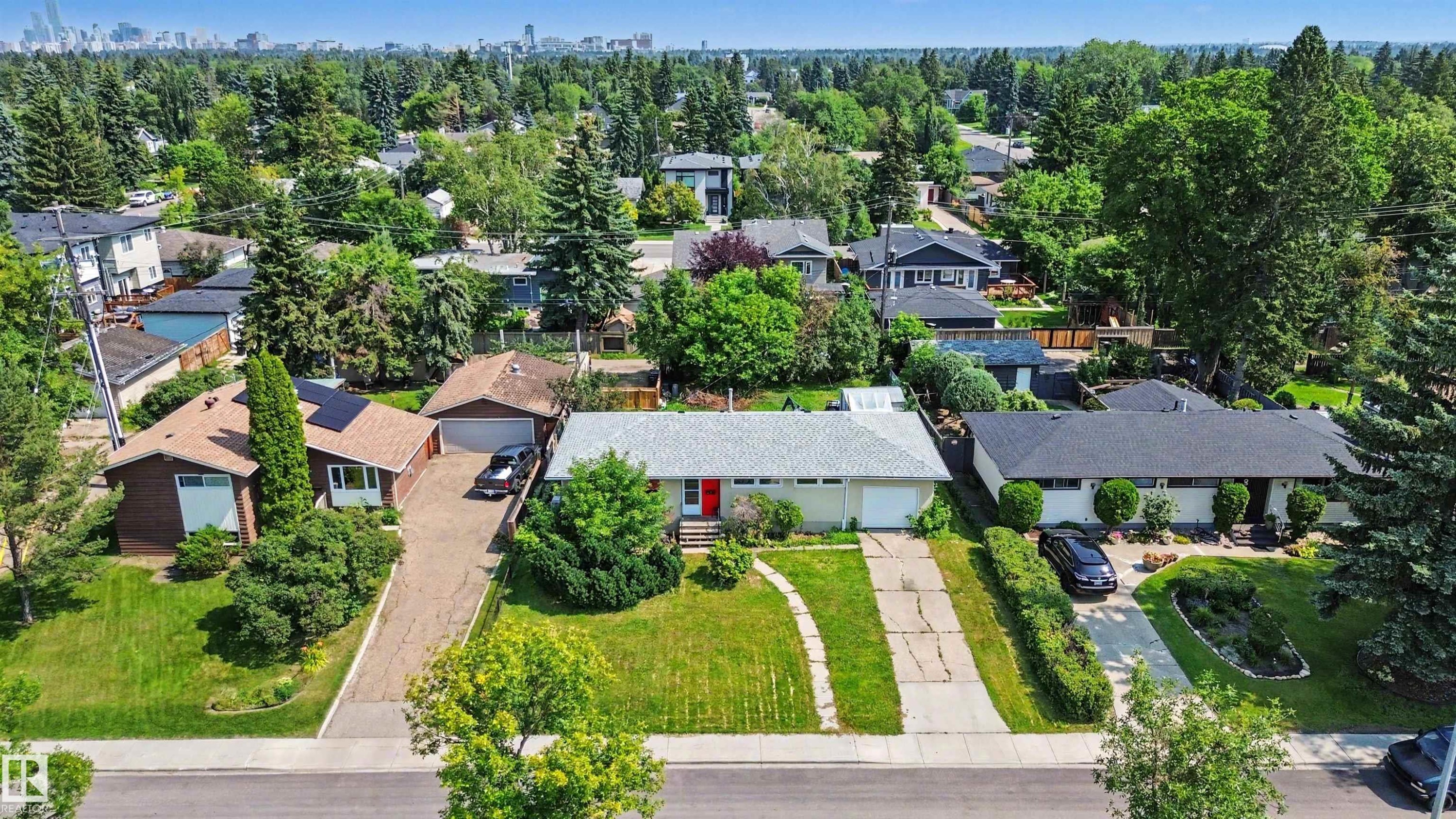 Aerial perspective showcasing a residential street lined with mature trees - 8215 149 Street Nw, Edmonton, AB - Outdoor