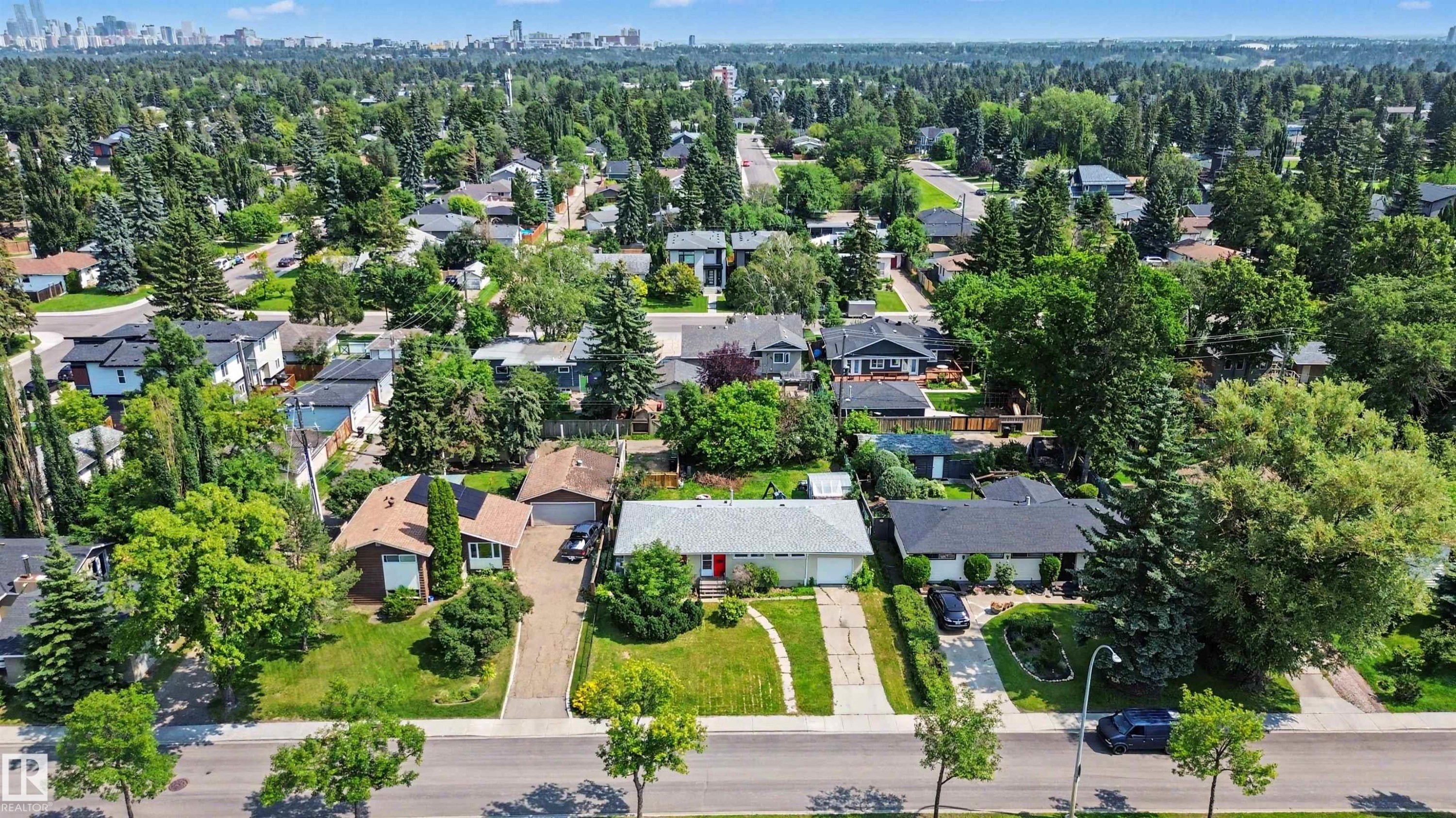 Residential neighborhood featuring mature trees and established properties - 8215 149 Street Nw, Edmonton, AB - Outdoor With View