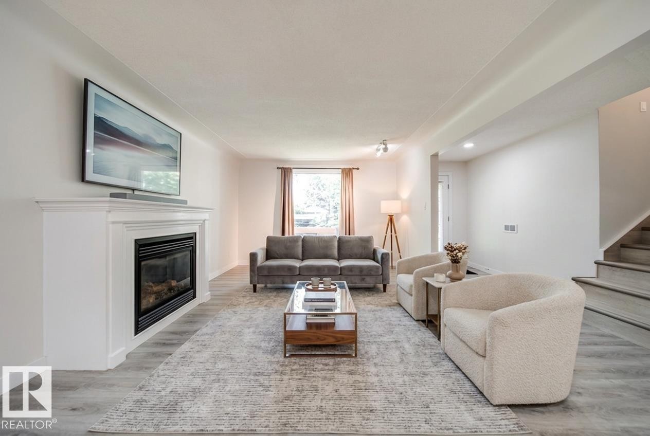 10519 140 Street Nw, Edmonton, AB - Indoor Photo Showing Living Room With Fireplace