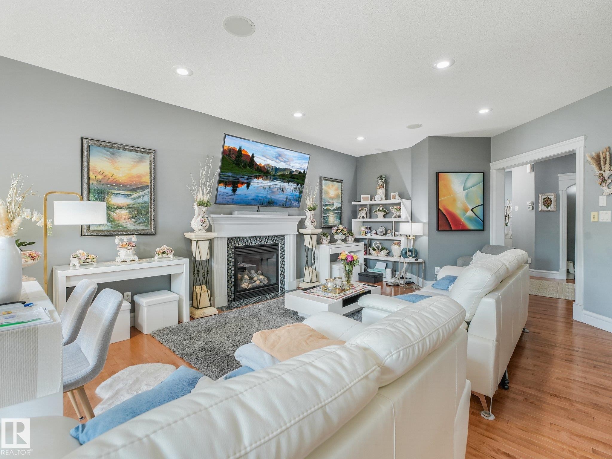 544 Adams Way Sw, Edmonton, AB - Indoor Photo Showing Living Room With Fireplace