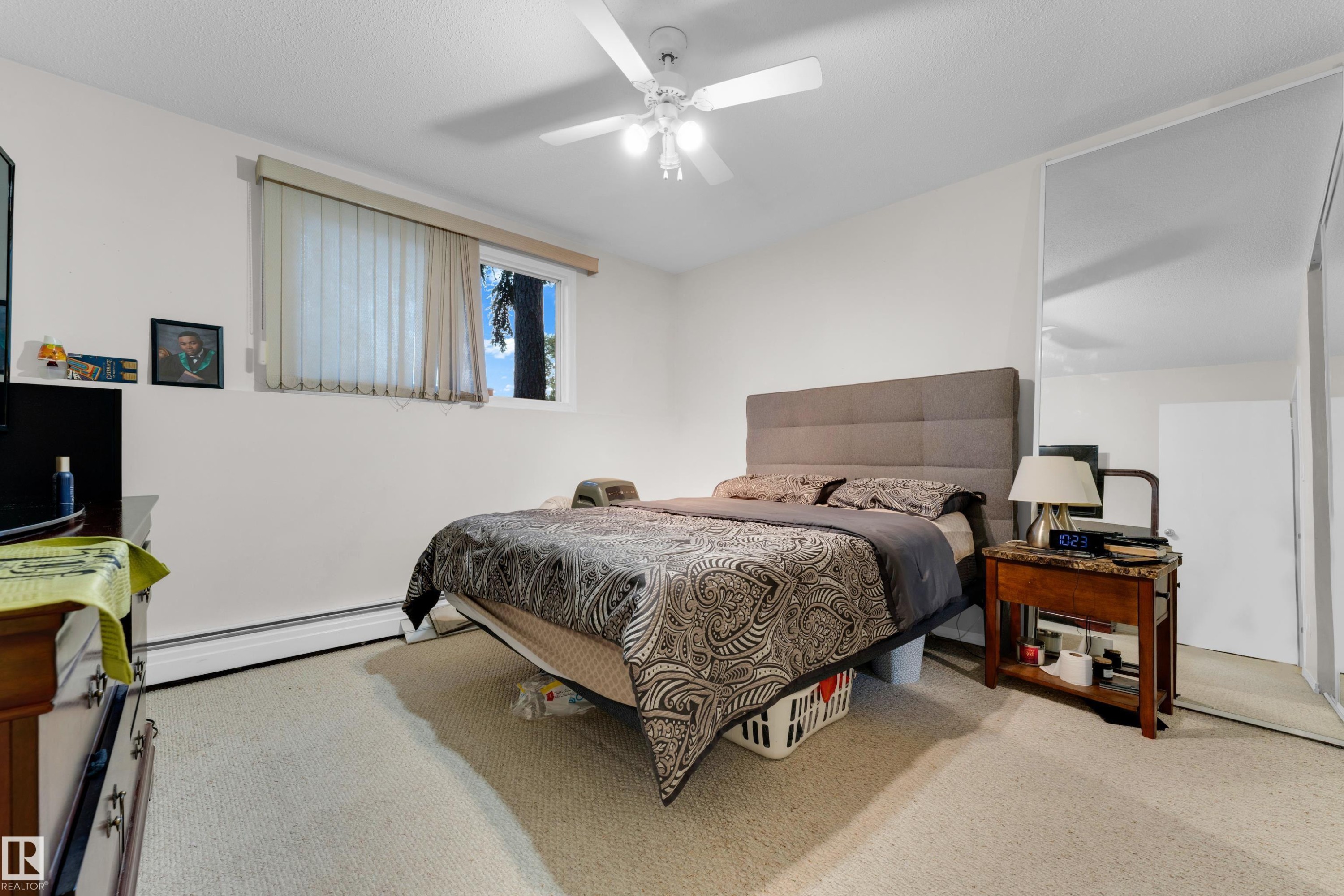 Bedroom featuring neutral carpeting and white walls - #104 11445 41 Av Nw, Edmonton, AB - Indoor Photo Showing Bedroom