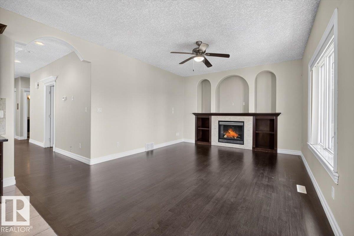 2836 34A Avenue Nw, Edmonton, AB - Indoor Photo Showing Living Room With Fireplace