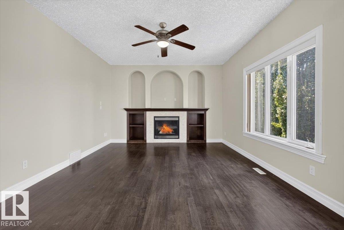 2836 34A Avenue Nw, Edmonton, AB - Indoor Photo Showing Living Room With Fireplace