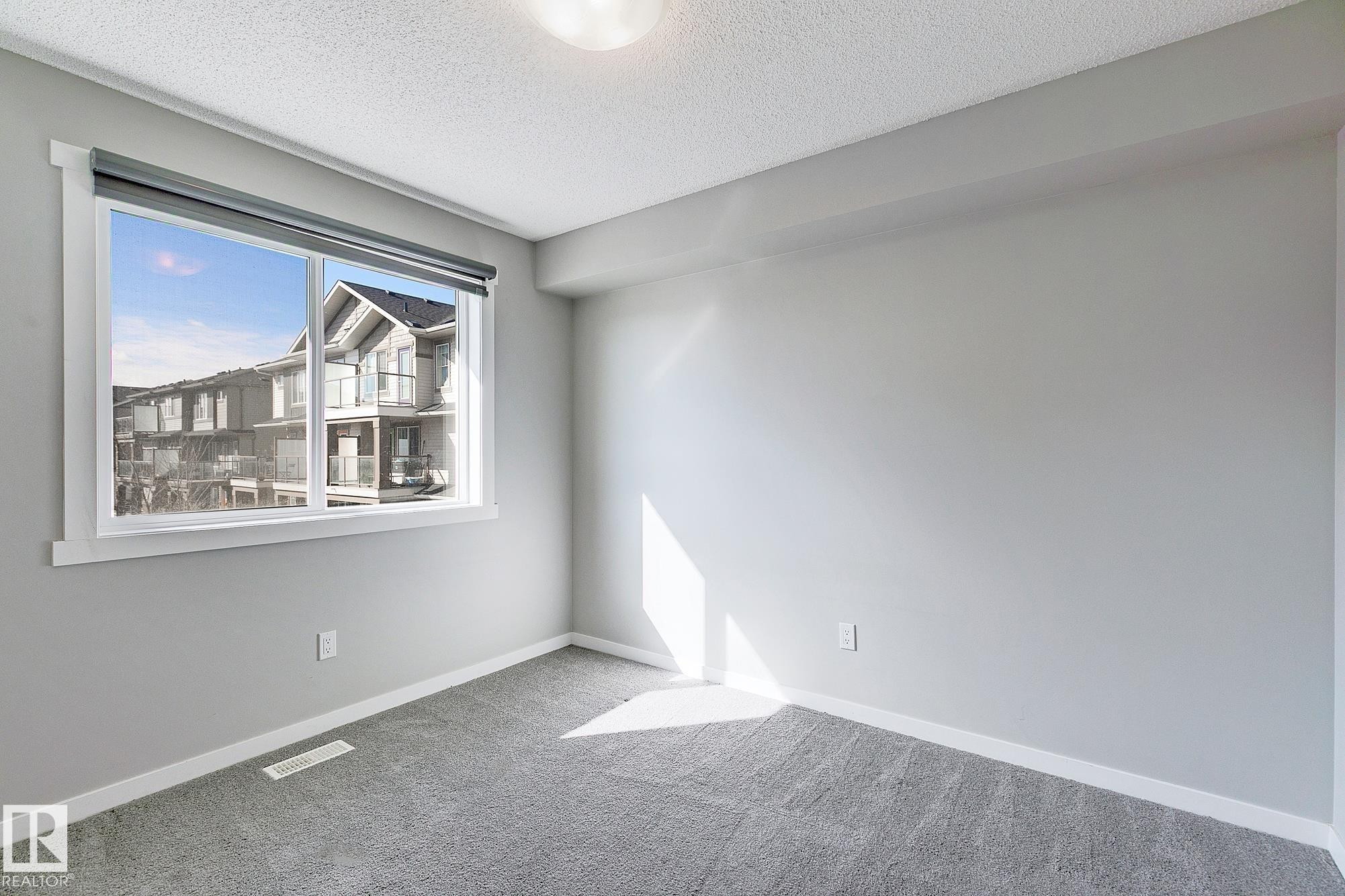 #20 1530 Tamarack Boulevard Nw, Edmonton, AB - Indoor Photo Showing Other Room