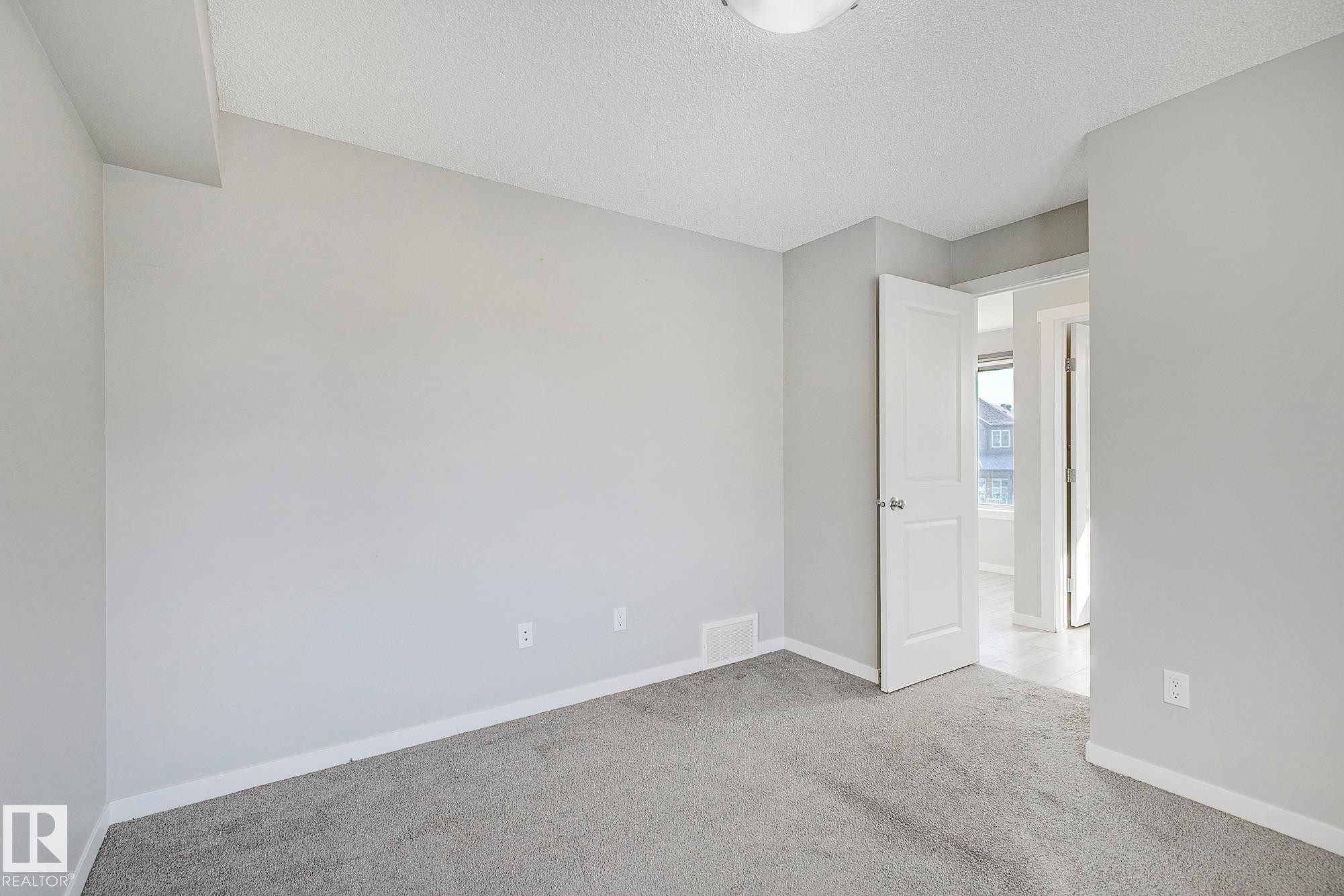 #20 1530 Tamarack Boulevard Nw, Edmonton, AB - Indoor Photo Showing Other Room