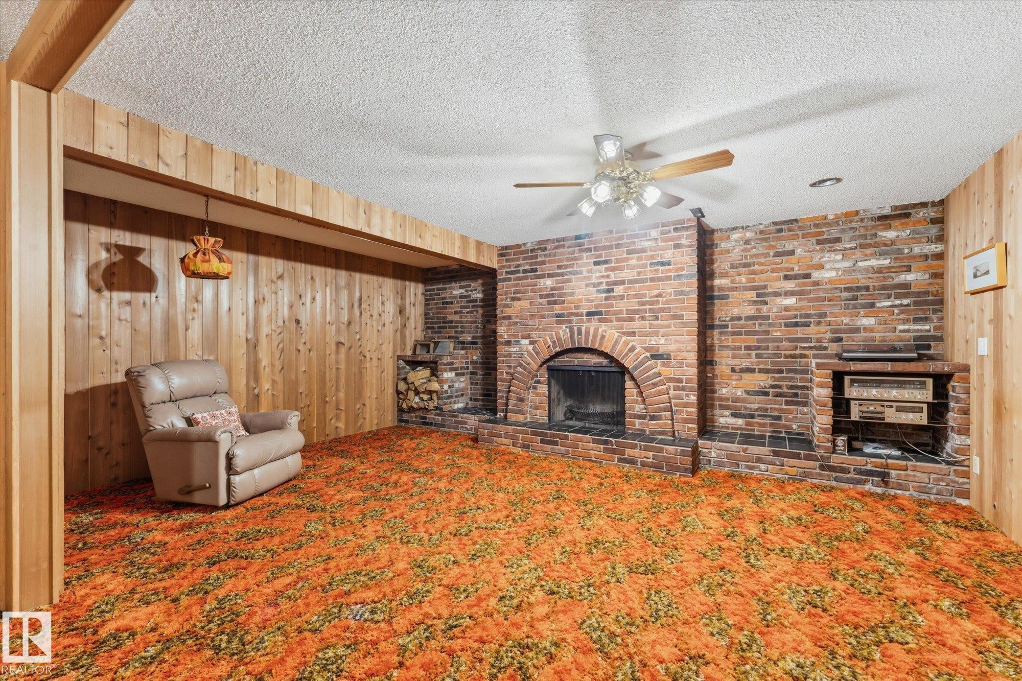 8727 73 Street Nw, Edmonton, AB - Indoor Photo Showing Living Room With Fireplace