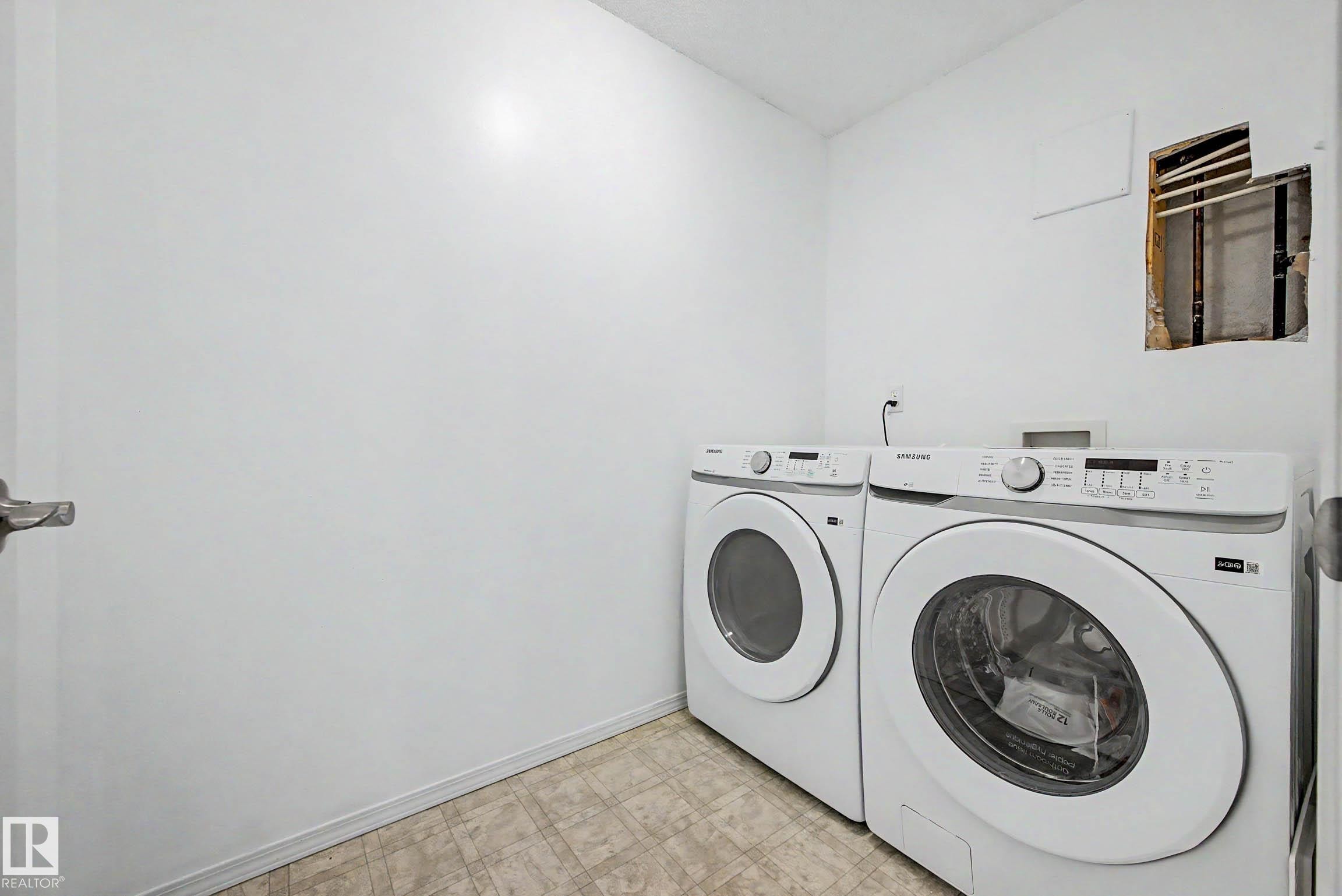 #203 8119 112 Av Nw, Edmonton, AB - Indoor Photo Showing Laundry Room