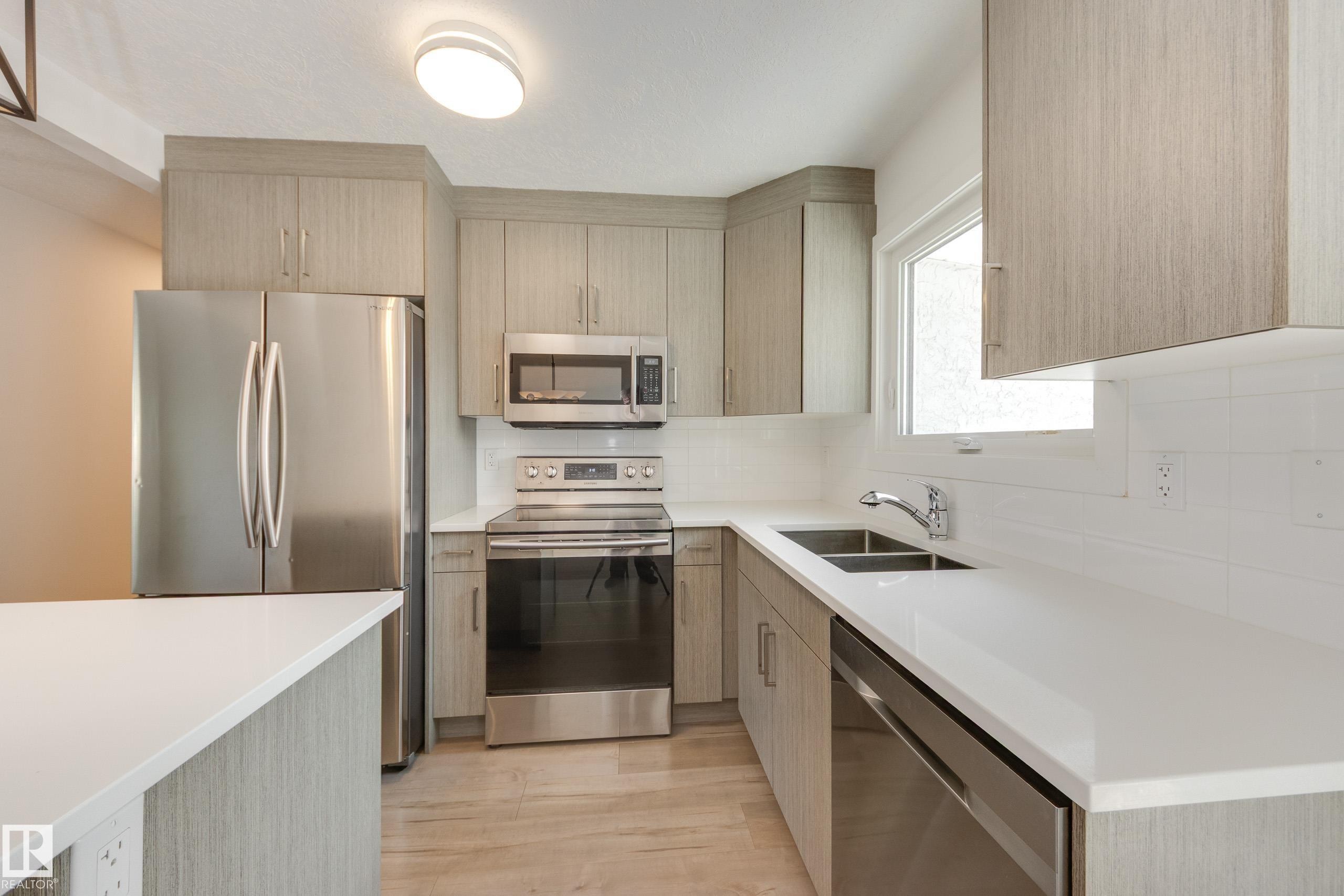 13112 90 Street Nw, Edmonton, AB - Indoor Photo Showing Kitchen With Double Sink