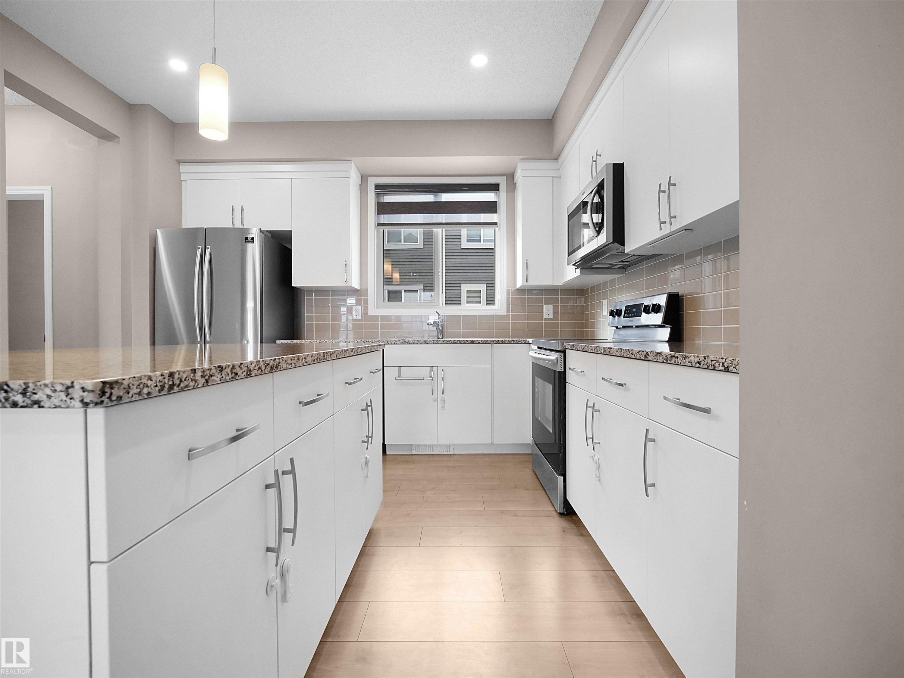 2080 Wonnacott Way Sw, Edmonton, AB - Indoor Photo Showing Kitchen With Upgraded Kitchen