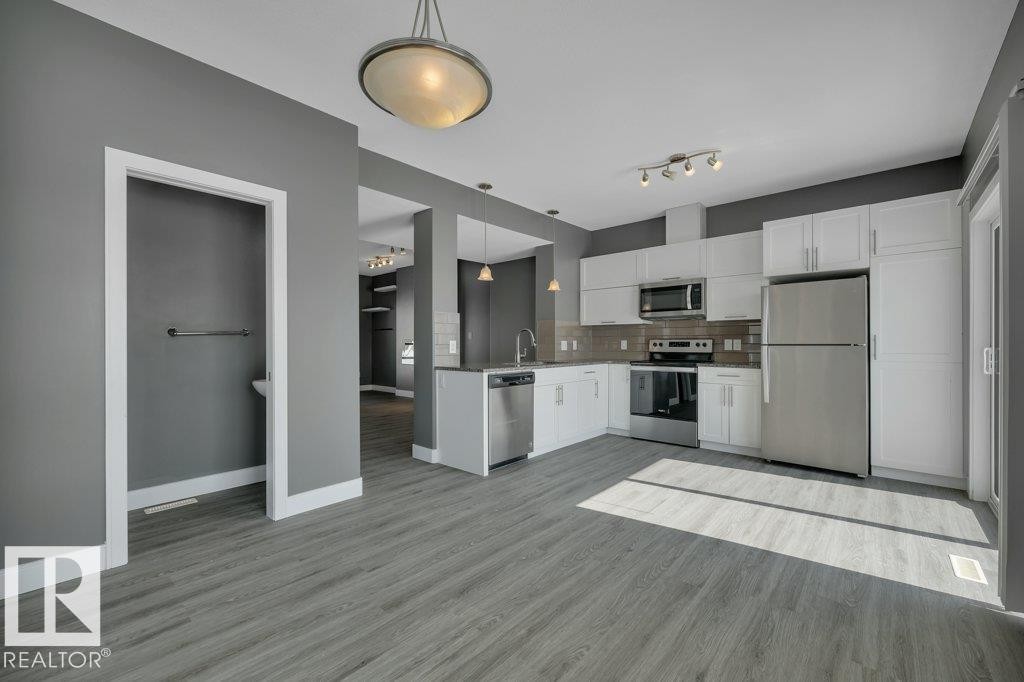 #13 13003 132 Av Nw, Edmonton, AB - Indoor Photo Showing Kitchen With Stainless Steel Kitchen