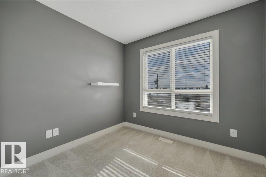 #13 13003 132 Av Nw, Edmonton, AB - Indoor Photo Showing Other Room