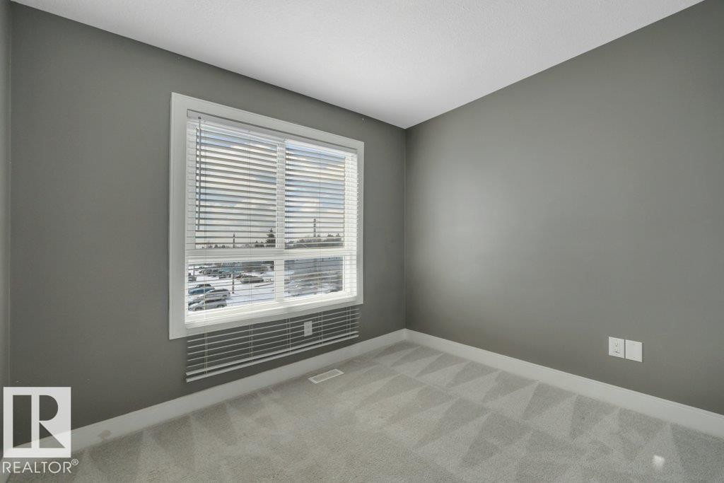 #13 13003 132 Av Nw, Edmonton, AB - Indoor Photo Showing Other Room