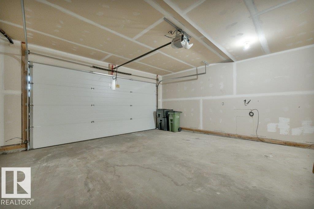 #13 13003 132 Av Nw, Edmonton, AB - Indoor Photo Showing Garage