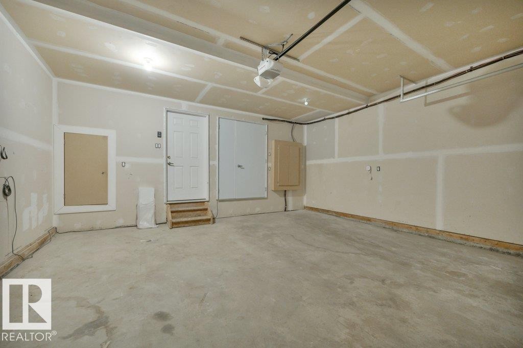 #13 13003 132 Av Nw, Edmonton, AB - Indoor Photo Showing Garage