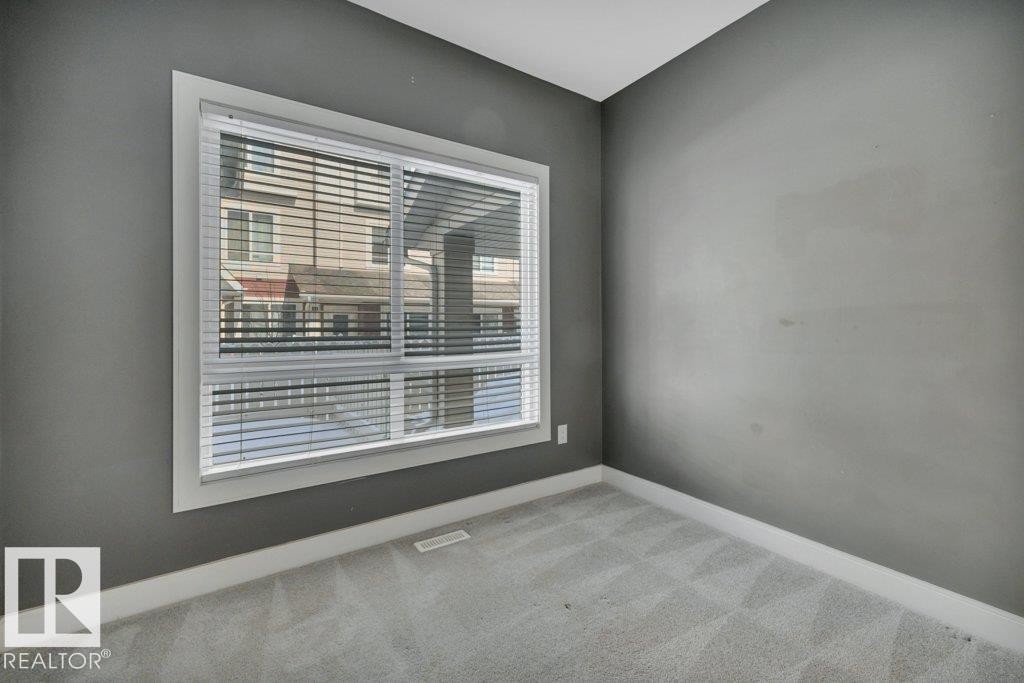 #13 13003 132 Av Nw, Edmonton, AB - Indoor Photo Showing Other Room