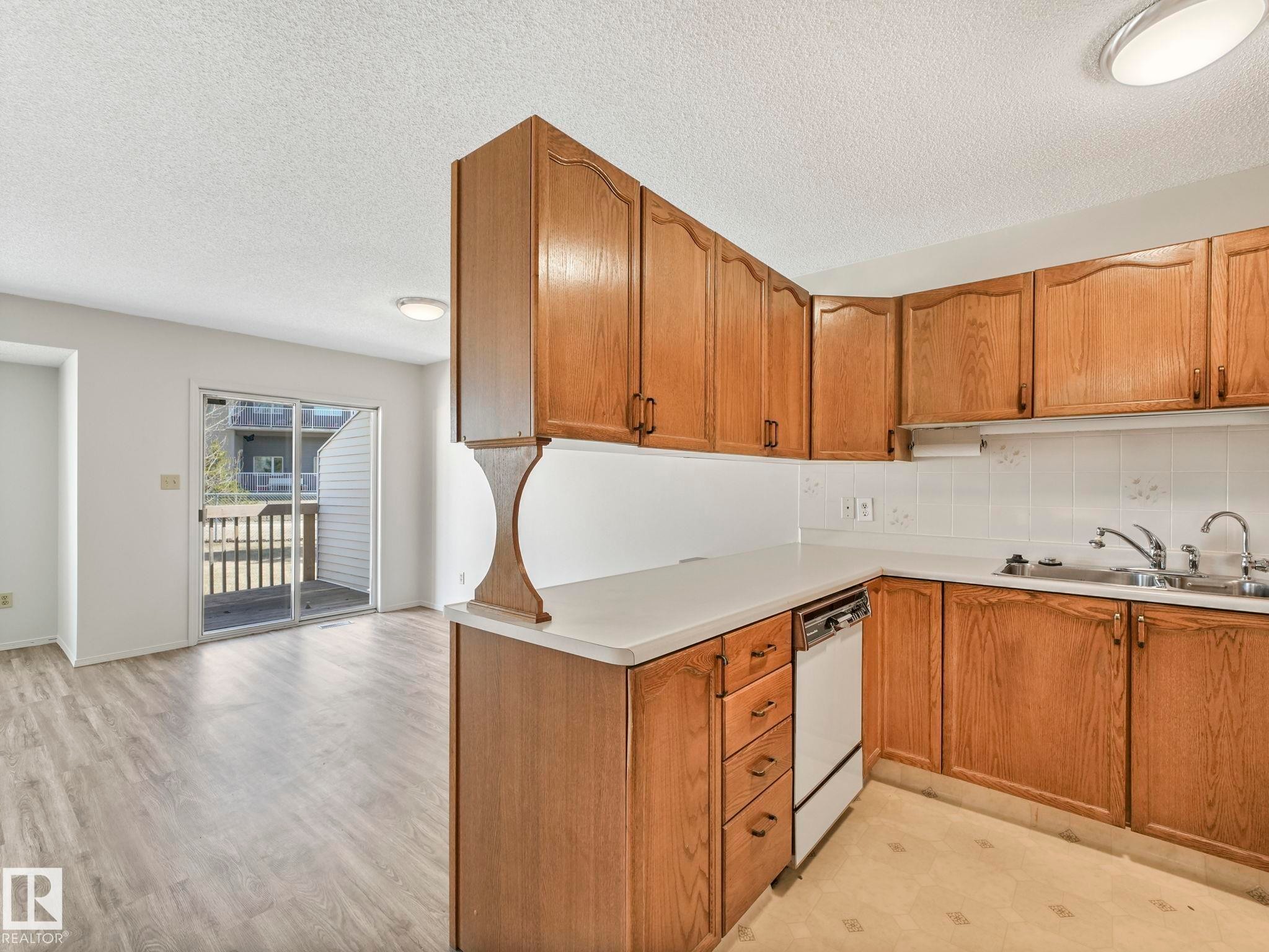 1521 62 Street Nw, Edmonton, AB - Indoor Photo Showing Kitchen With Double Sink
