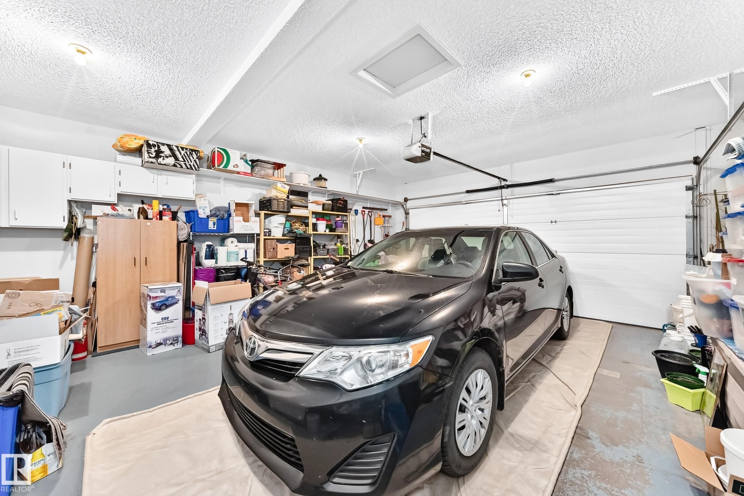 #204 4807 43A Av, Leduc, AB - Indoor Photo Showing Garage