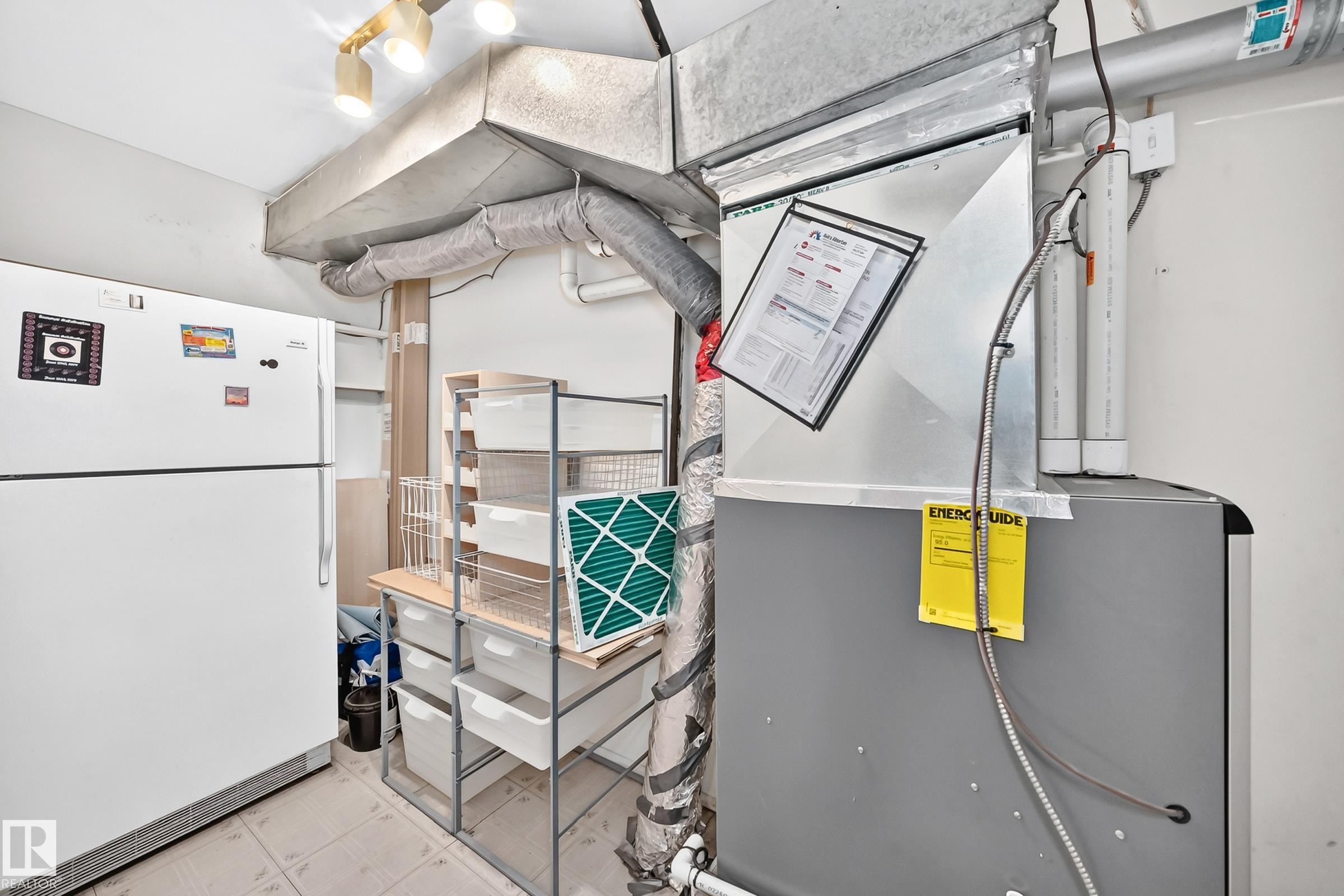 Utility area featuring an HVAC system and exposed ductwork - 290 Lancaster Terrace Nw, Edmonton, AB - Indoor