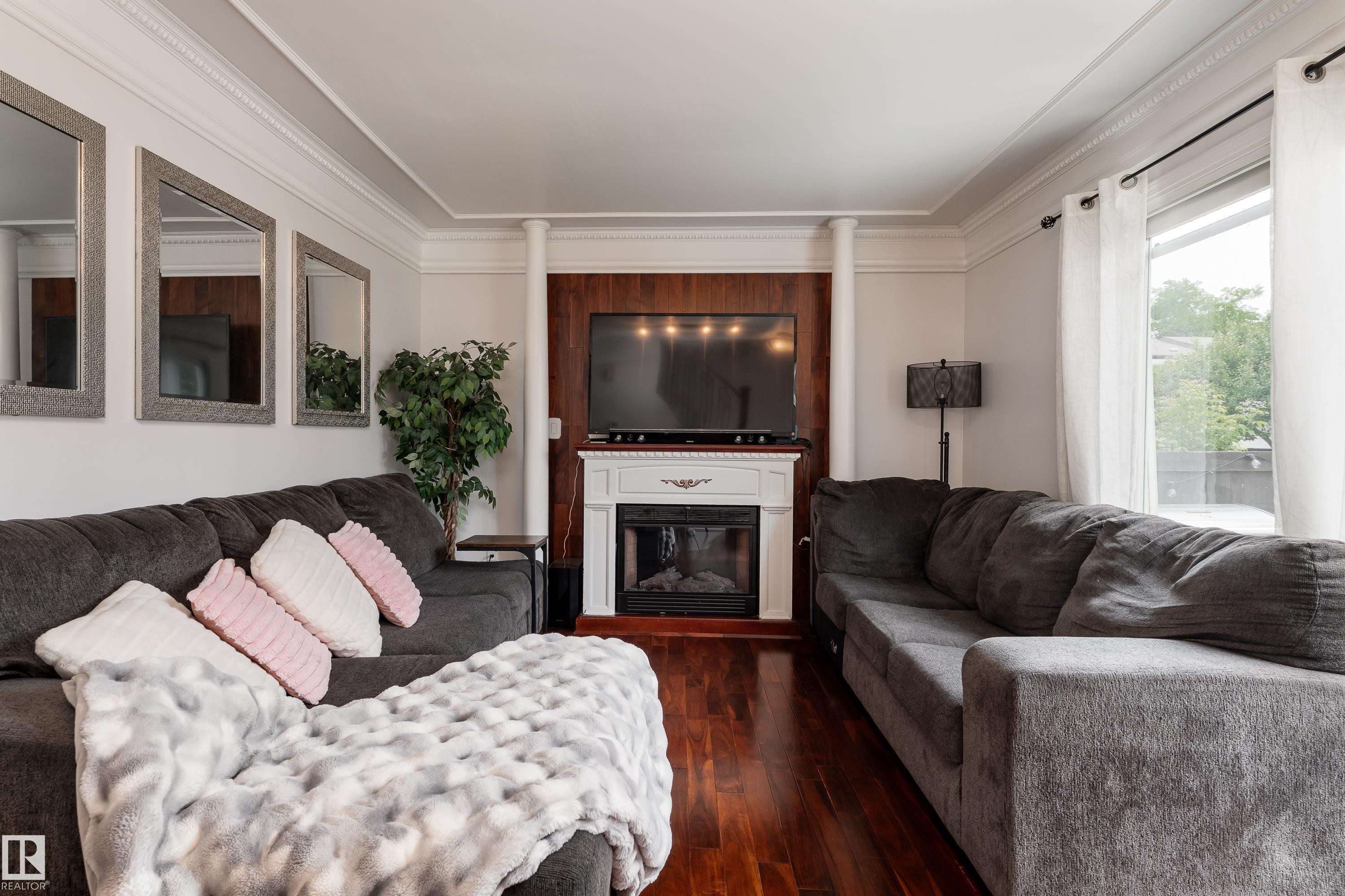 Living room - 747 Clareview Road Nw, Edmonton, AB - Indoor Photo Showing Living Room With Fireplace