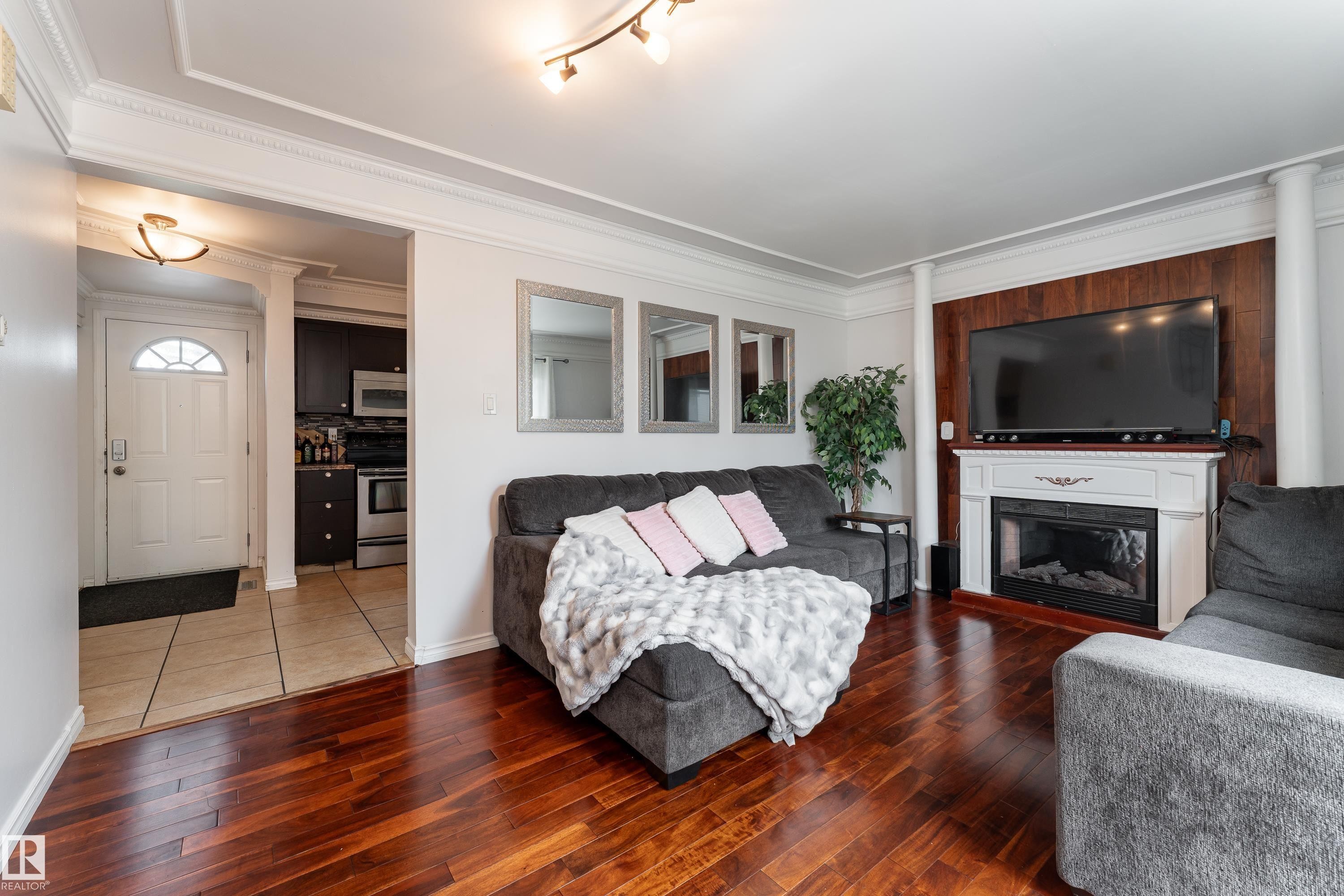 747 Clareview Road Nw, Edmonton, AB - Indoor Photo Showing Living Room With Fireplace
