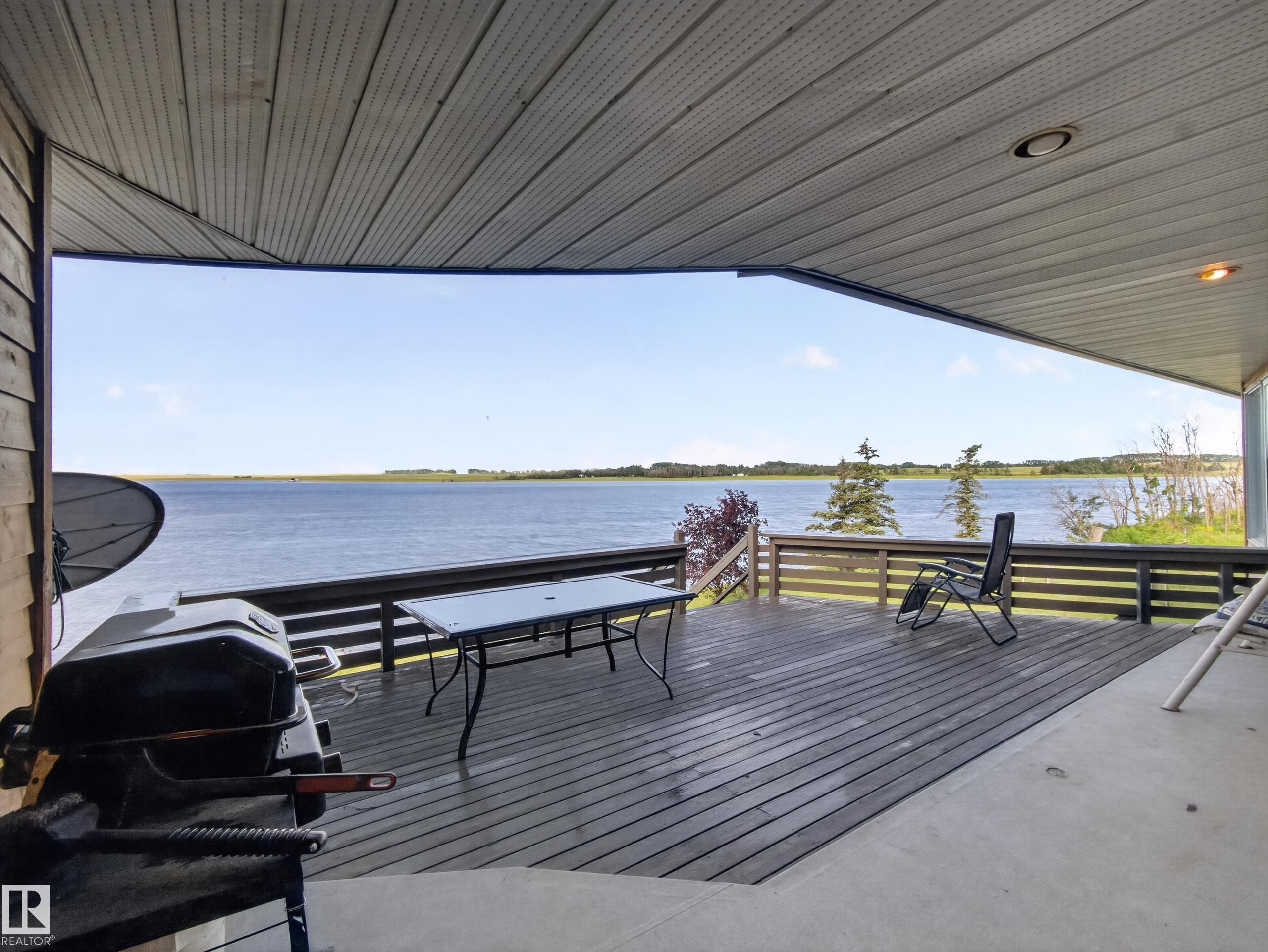 48208 Range Road, Rural Beaver County, AB - Outdoor With Body Of Water With Deck Patio Veranda With Exterior