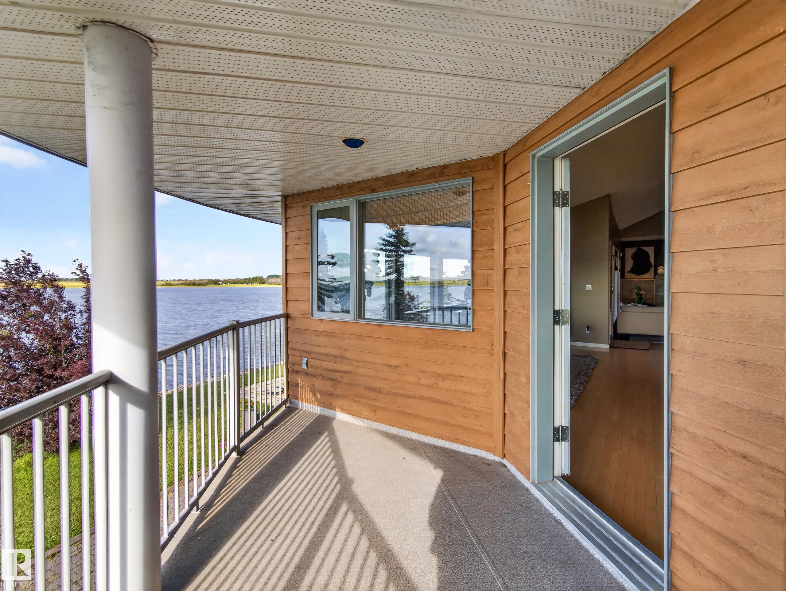 48208 Range Road, Rural Beaver County, AB - Outdoor With Body Of Water With Deck Patio Veranda With Exterior
