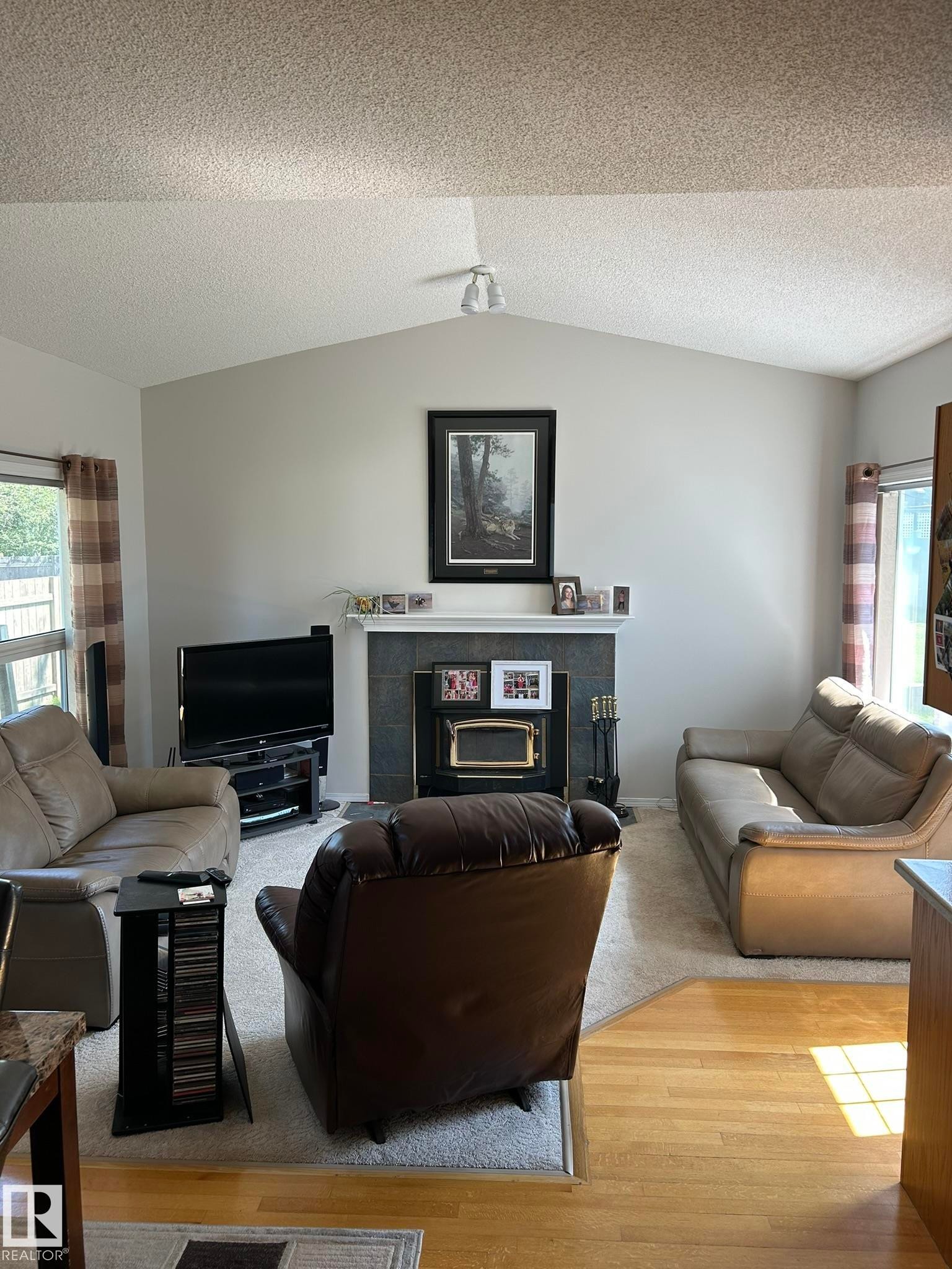 4014 Champagne Drive, Athabasca Town, AB - Indoor Photo Showing Living Room With Fireplace