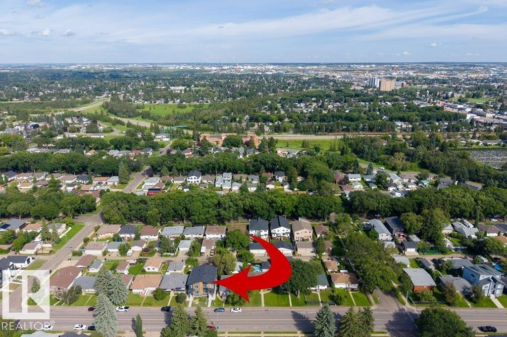 Residential property situated within a tree-lined neighborhood - 10323 79 Street Nw, Edmonton, AB - Outdoor With View