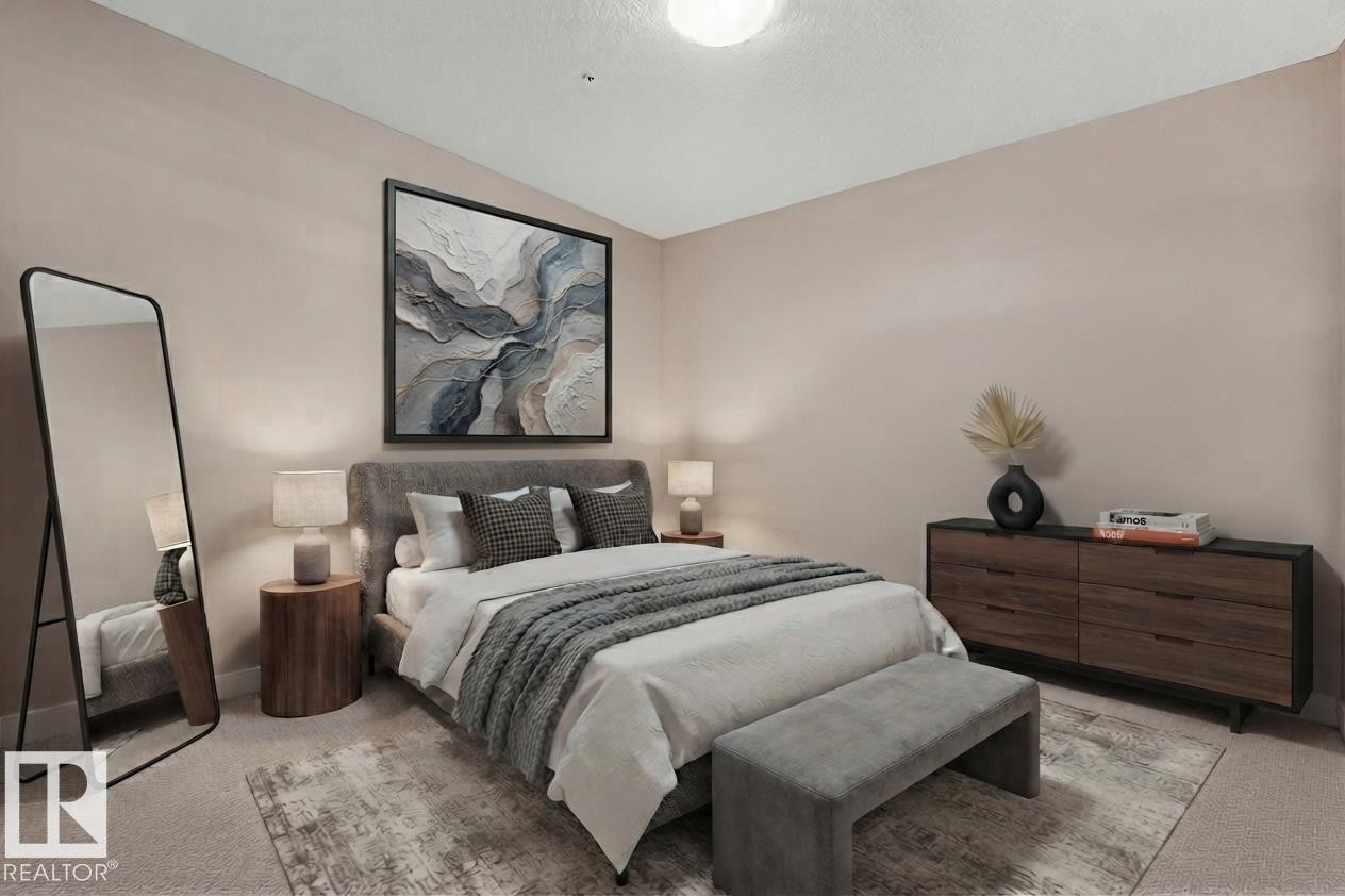 Warm neutral wall tones and carpeted flooring create a comfortable atmosphere - #120 8931 156 St Nw, Edmonton, AB