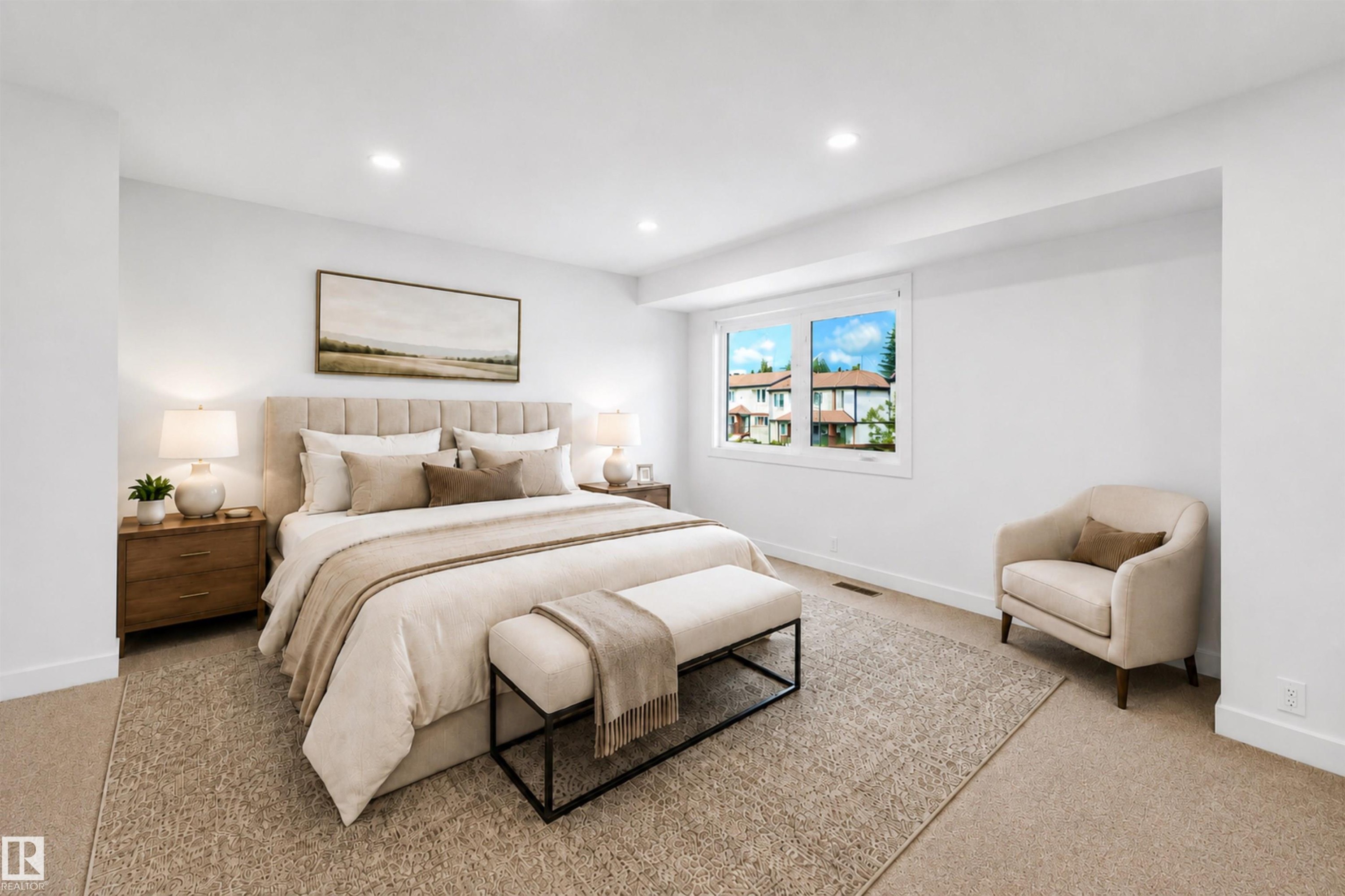 Bright interior with recessed lighting, large window, and light-toned carpeting - #39 14511 52 Street Nw, Edmonton, AB