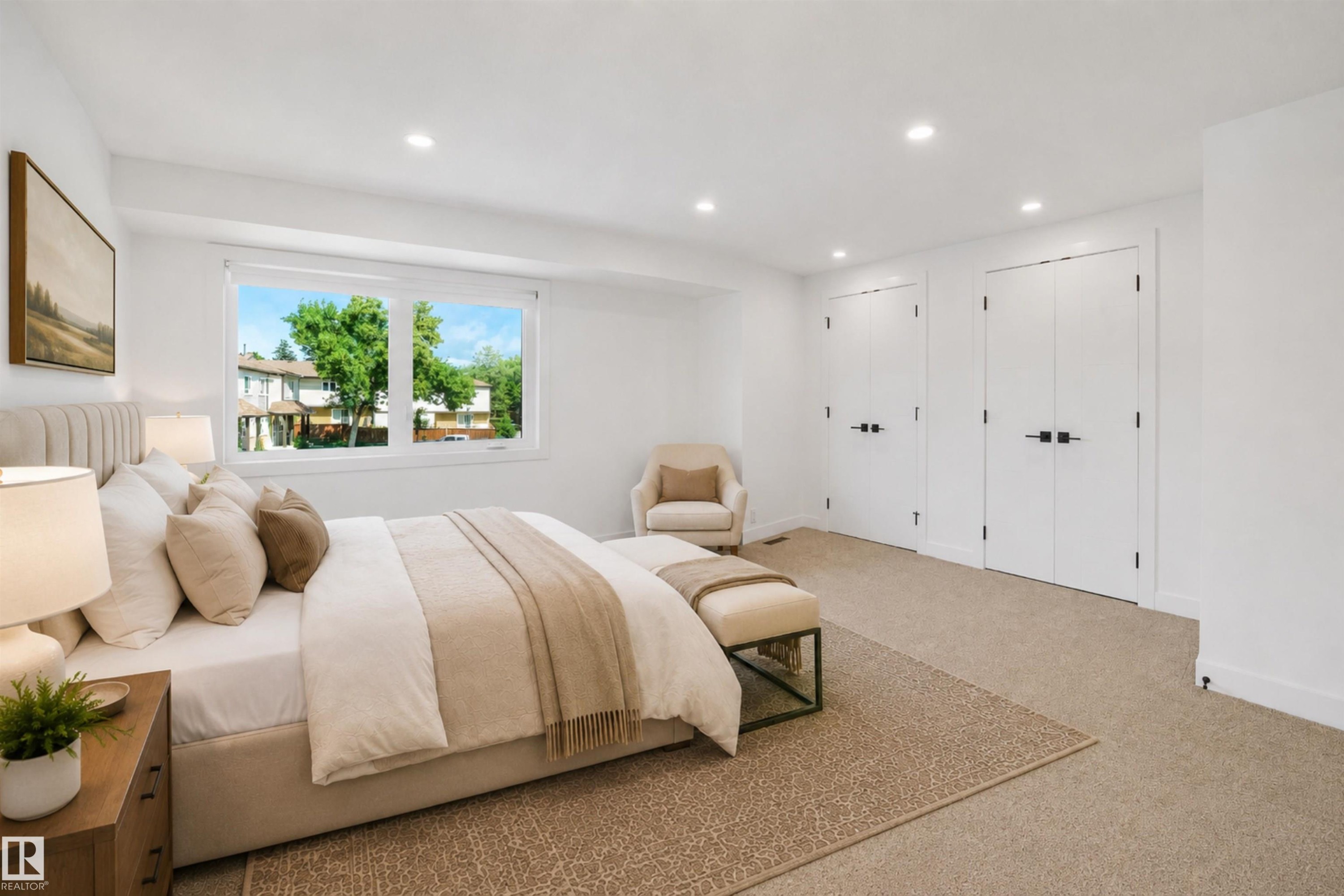 Recessed lighting with a large window, carpet flooring, and two sets of double doors - #39 14511 52 Street Nw, Edmonton, AB