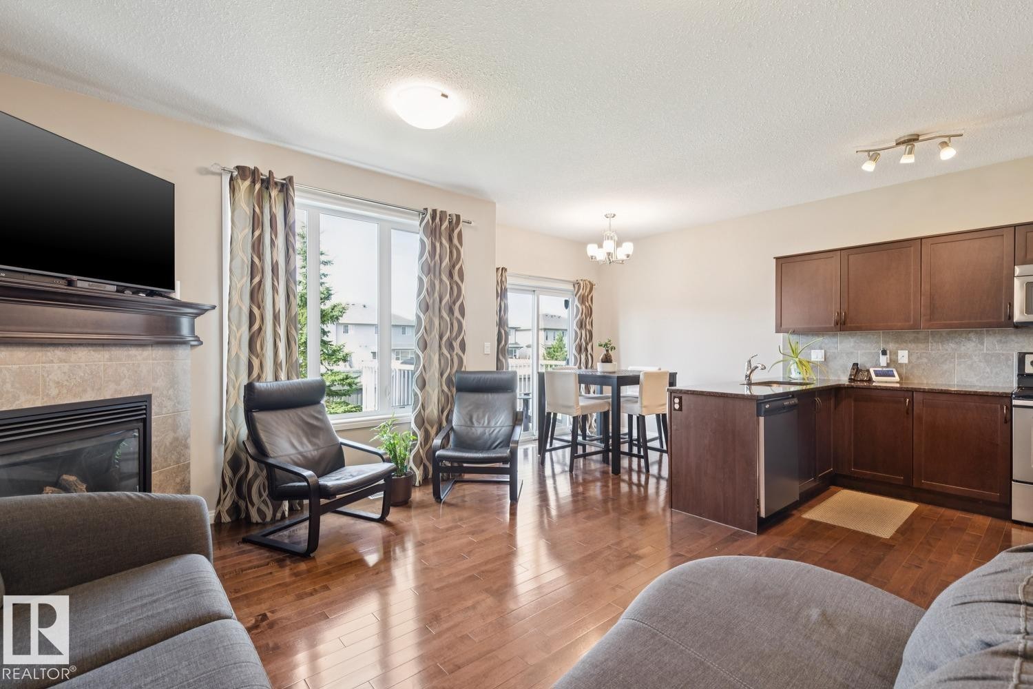 #12 18230 104A St Nw, Edmonton, AB - Indoor Photo Showing Other Room With Fireplace